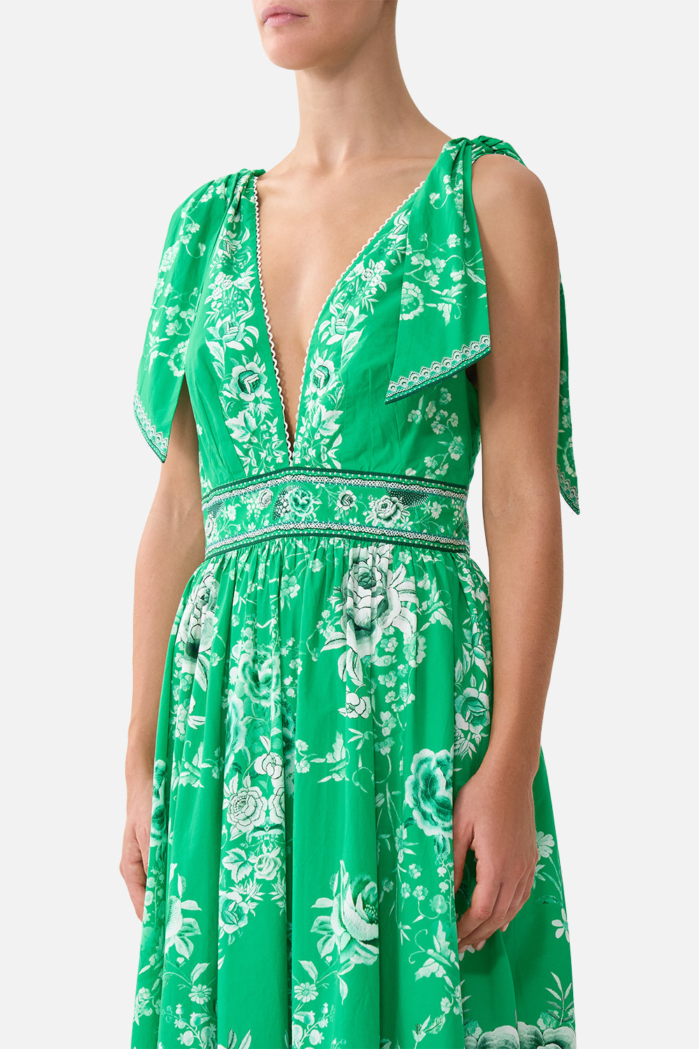 The CAMILLA LONG DRESS WITH TIE FRONT DIAL UP THE TILES in our  print.