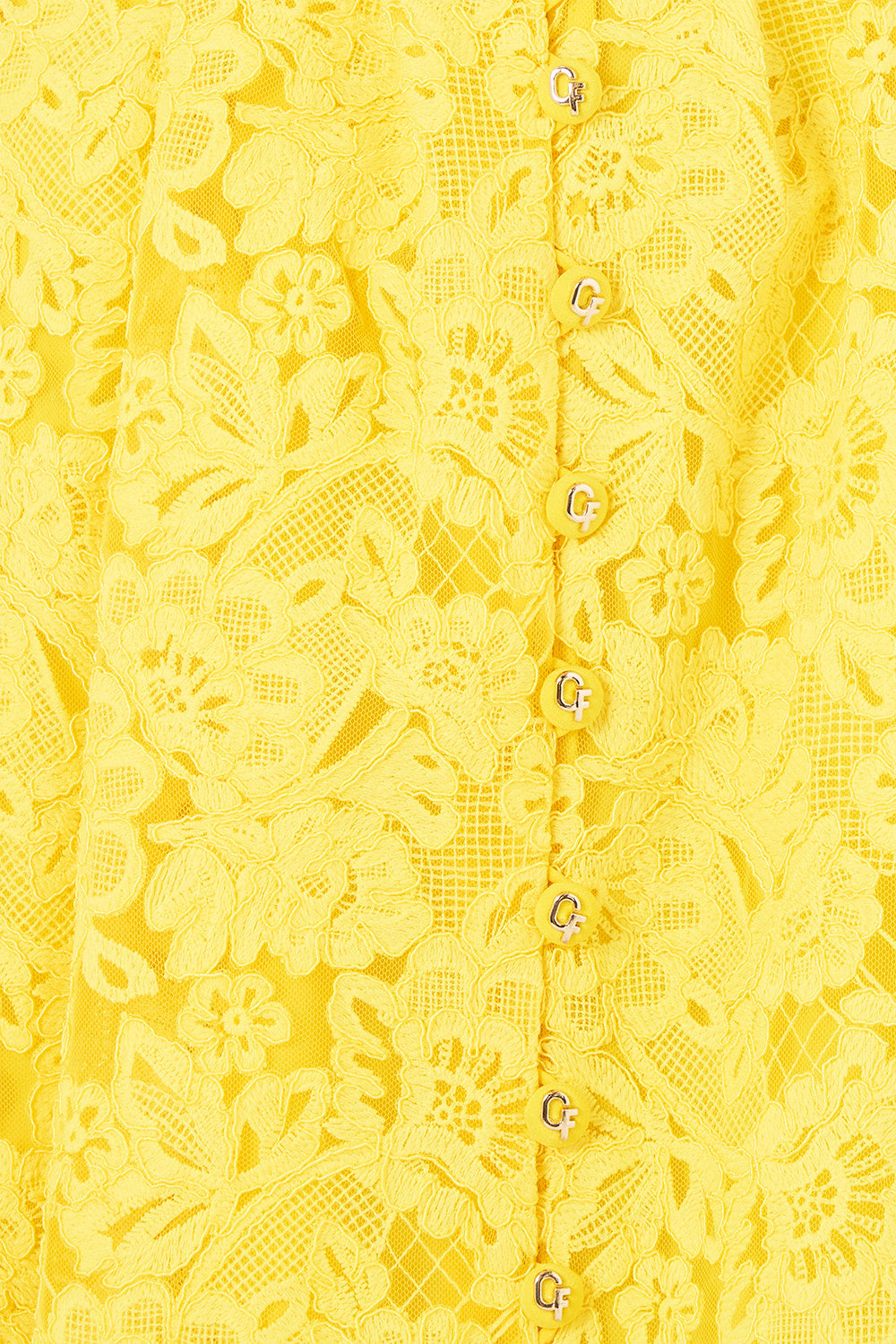 The CAMILLA TIE FRONT SHORT DRESS WITH HEM RUFFLE OLÉ OLÉ in our  print.