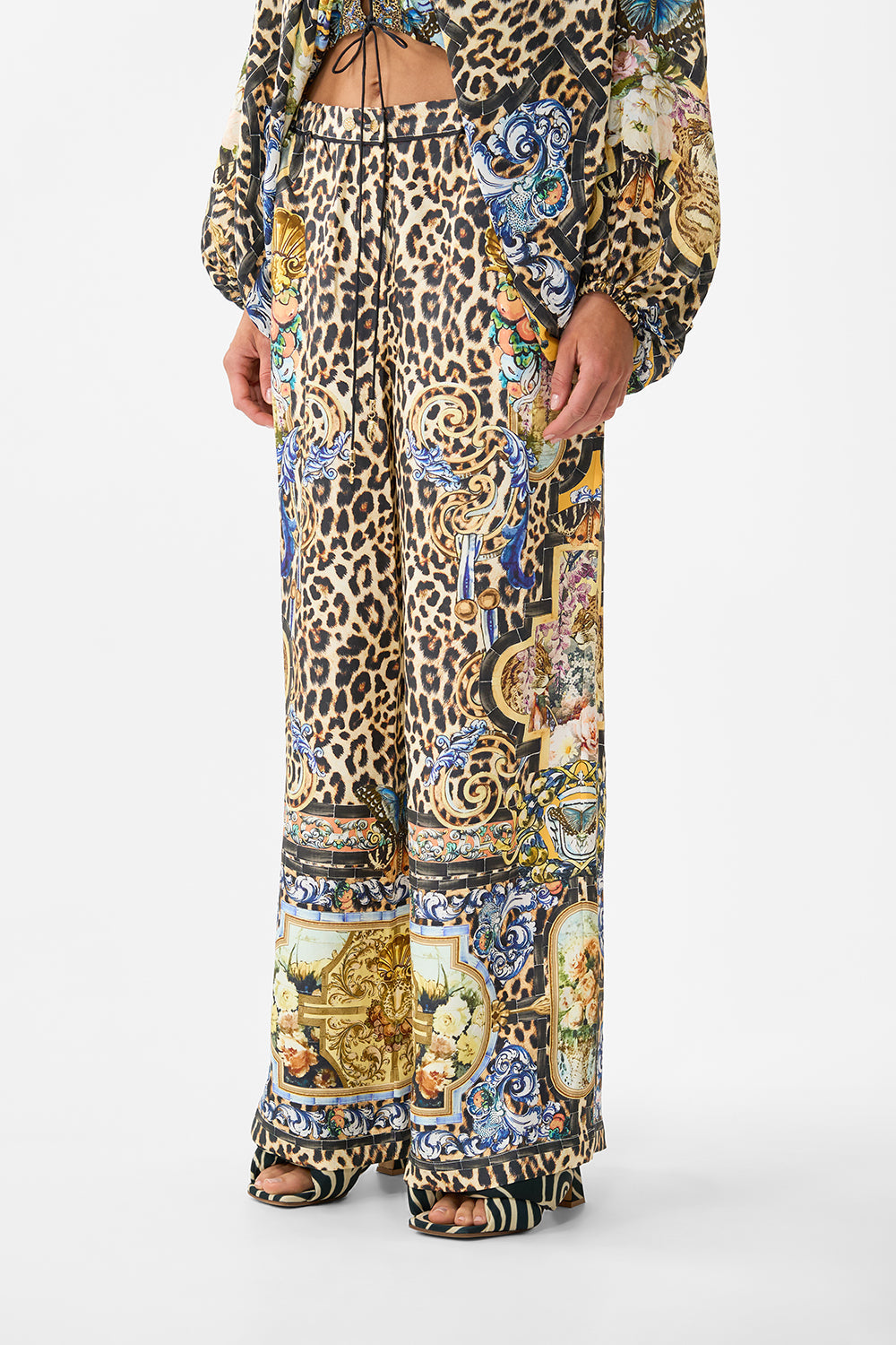 The CAMILLA FRILL NECK DRESS WITH HARDWARE DAUGHTERS OF DUENDE in our  print.