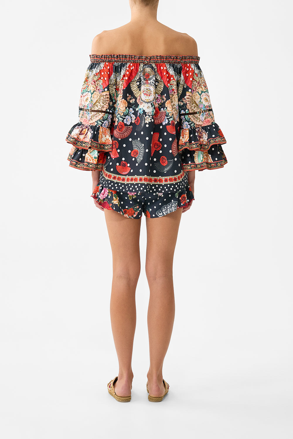 The CAMILLA DRAWSTRING POUCH BAG WITH CHAIN STRAP TORERO LIBERTINE in our  print.