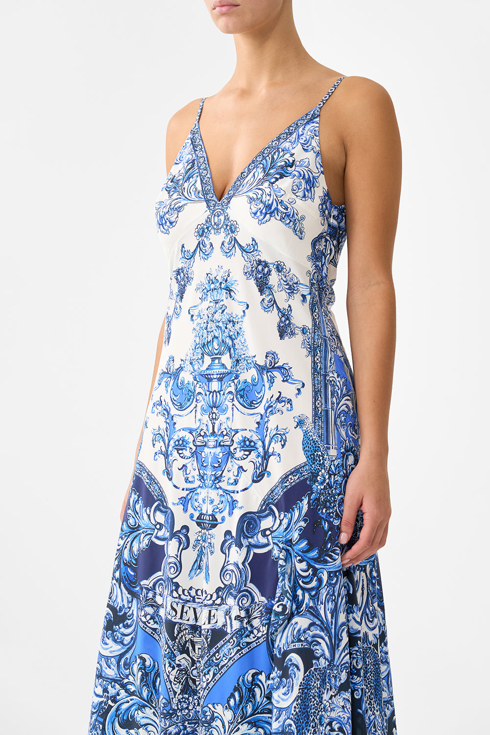 The CAMILLA KIDS LONG SLEEVE TEE MINI DRESS W FRILL HEM DIAL UP THE TILES in our  print.