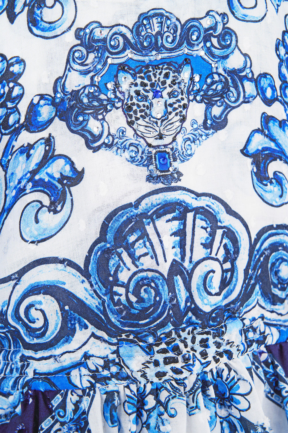 The CAMILLA MID LENGTH BOARDSHORT WITH ELASTIC WAIST TAURUS RISING in our  print.