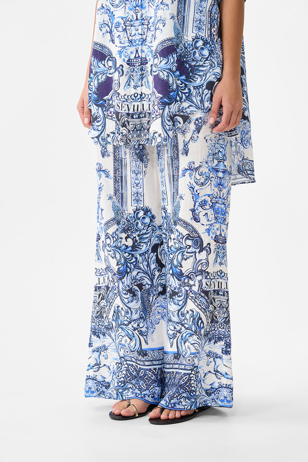The CAMILLA STEPPED HEM SHIRT I LEFT MY HEART IN GRANADA in our I LEFT MY HEART IN GRANADA print.