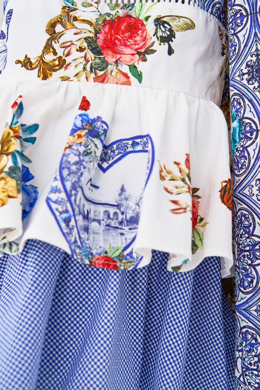 The CAMILLA SHAPED WAISTBAND DRESS WITH FLUTTER SLEEVES ESPAÑA NIRVANA in our  print.