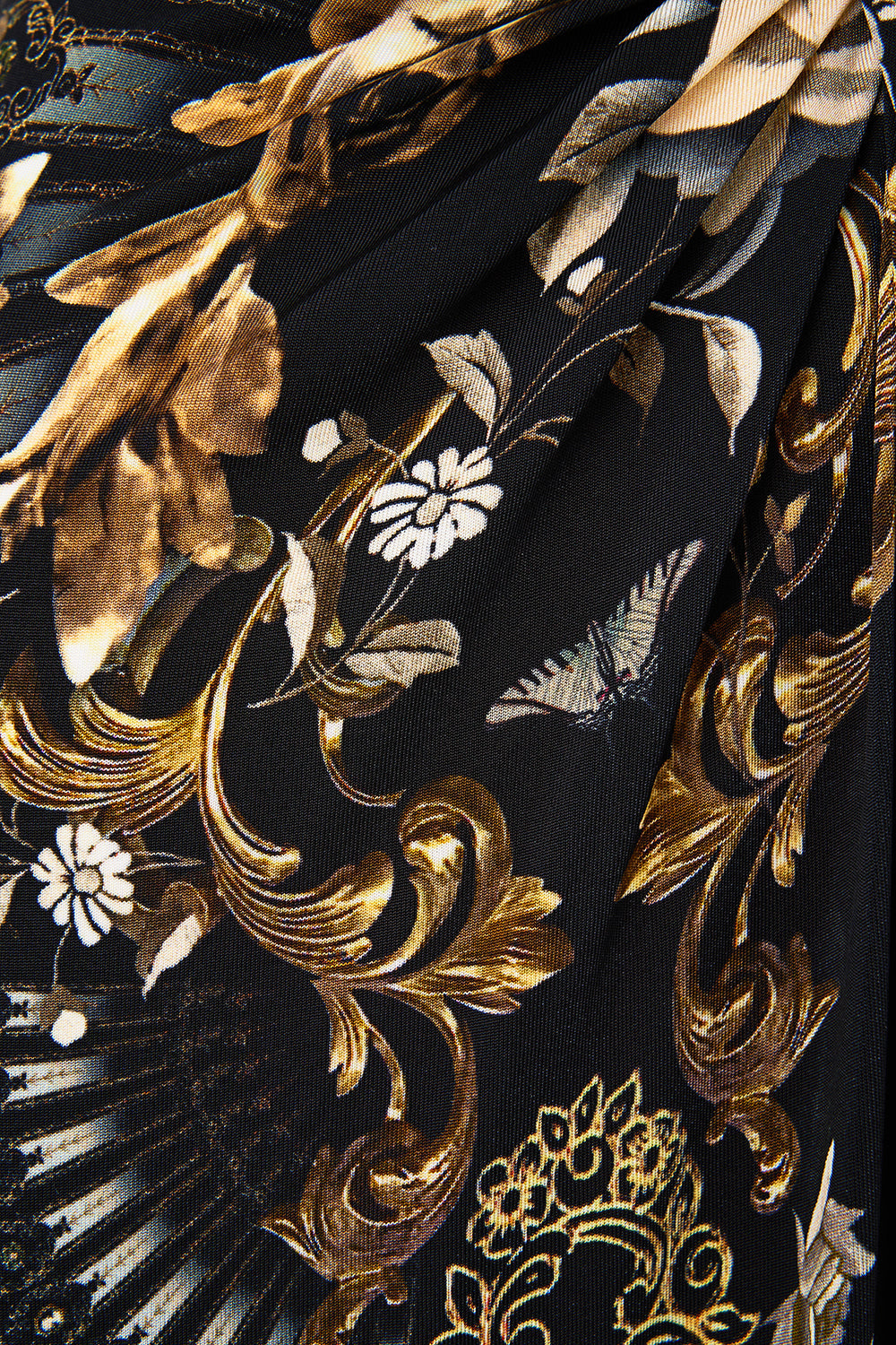 The CAMILLA TUCK FRONT SHORT MILLA IN SEVILLA in our  print.