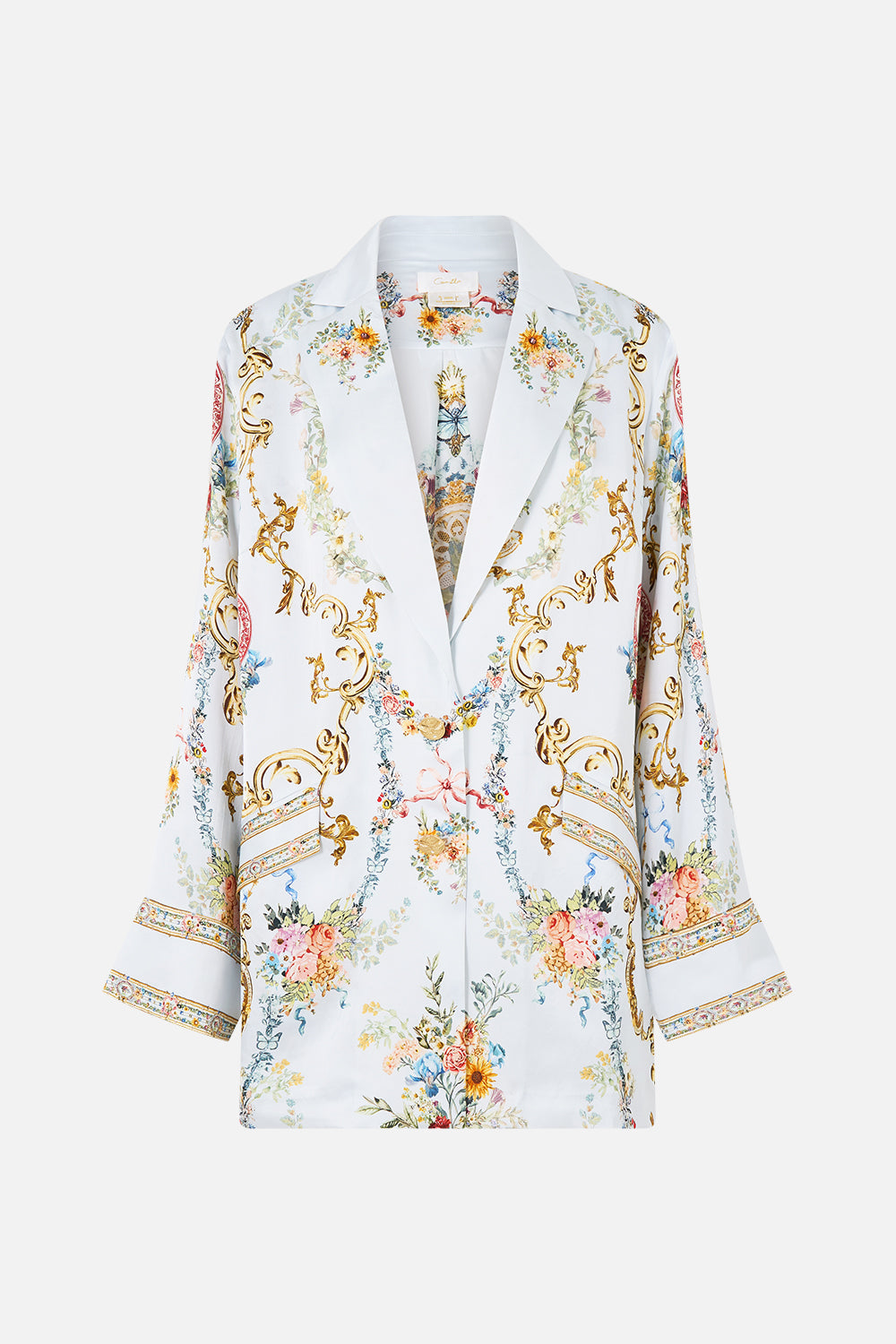 The CAMILLA TIE FRONT UNDERWIRE BIKINI TOP WITH PUFF SLEEVE THE CALL OF CATALONIA in our  print.