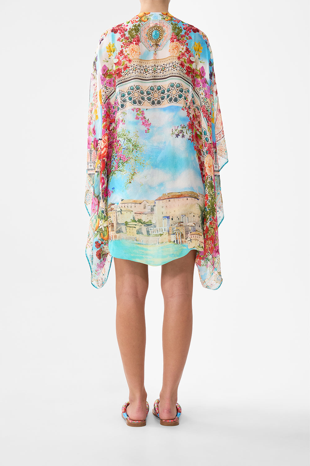 The CAMILLA BUTTON FRONT HALTER PLAYSUIT BALEARIC BEBÉ in our  print.