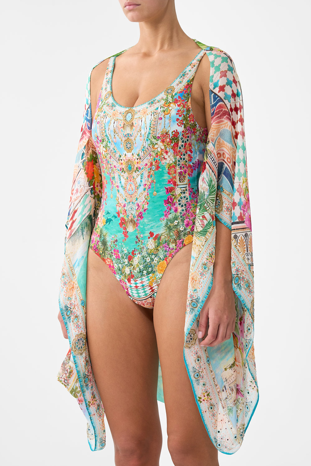 The CAMILLA BUTTON FRONT HALTER PLAYSUIT BALEARIC BEBÉ in our  print.