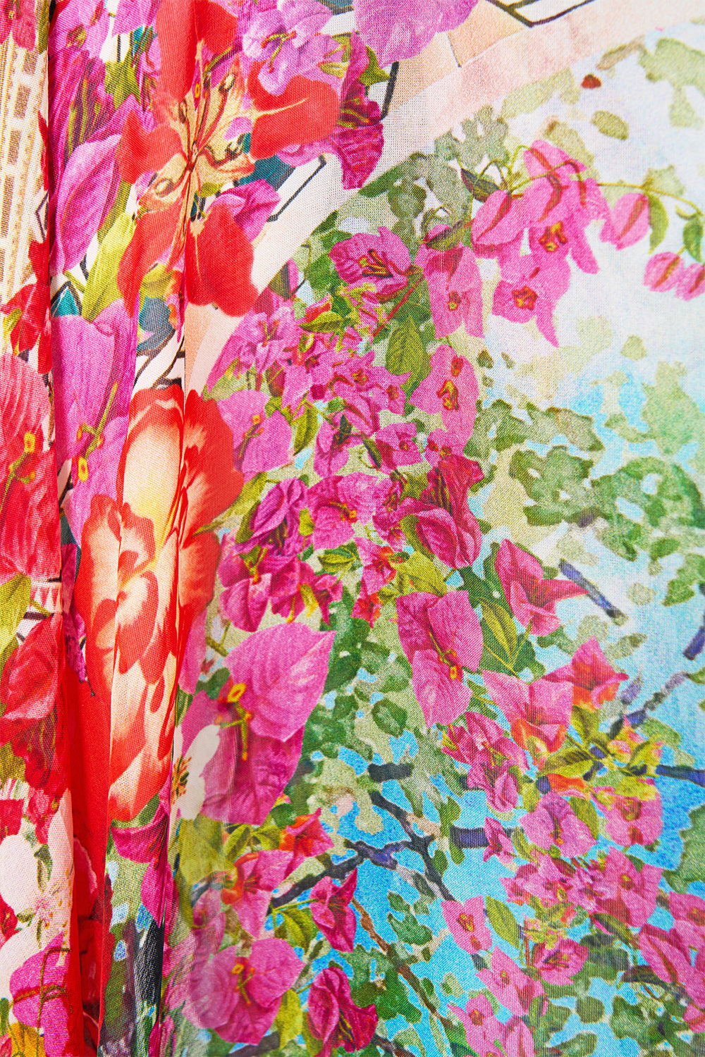 The CAMILLA MID LENGTH BOARDSHORT WITH FIXED WAIST THE HUM OF THE ALHAMBRA in our  print.