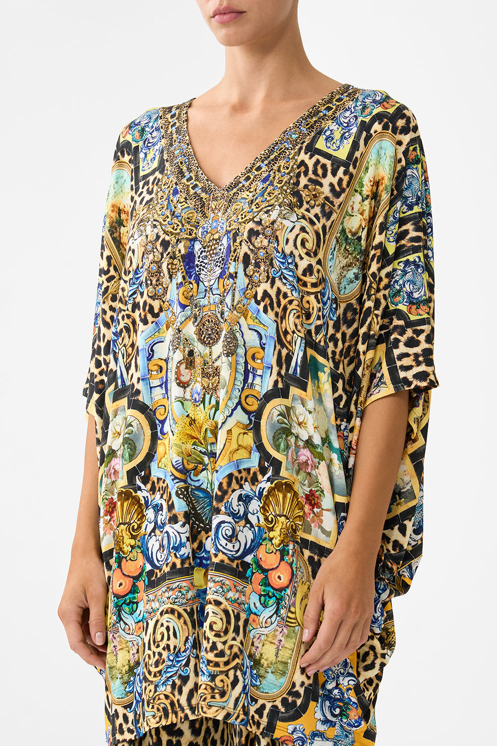 The CAMILLA MID LENGTH BOARDSHORT WITH ELASTIC WAIST DE NADA GRANADA in our  print.