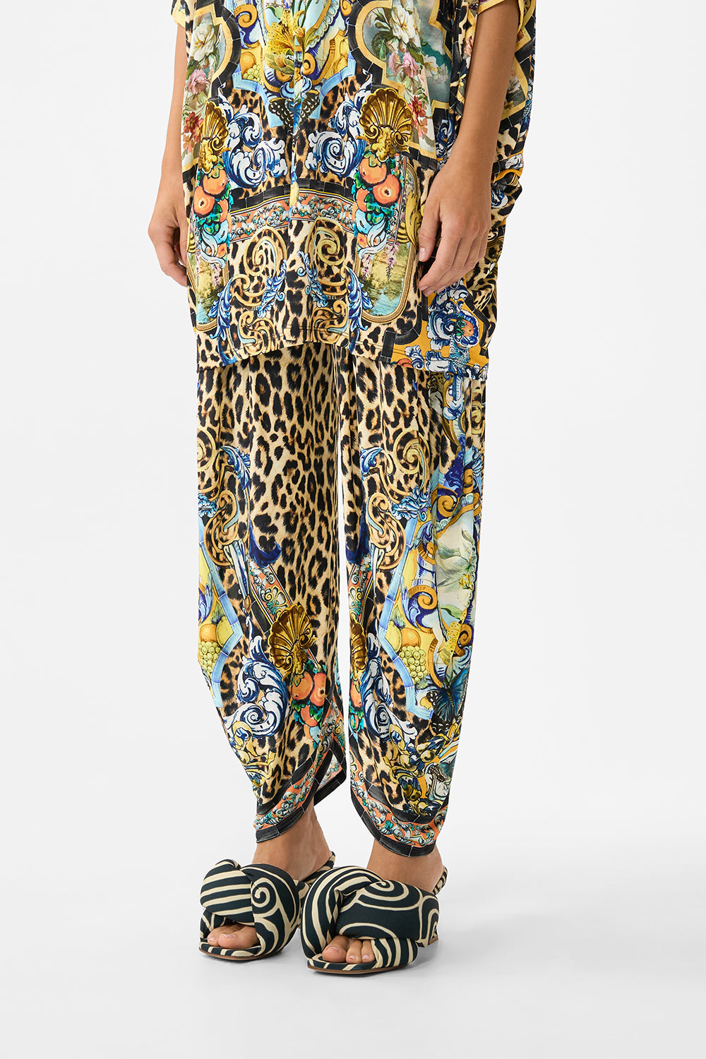 The CAMILLA SHORT SLEEVE CABANA SHIRT MAGIC OF THE MERCADO in our MAGIC OF THE MERCADO print.