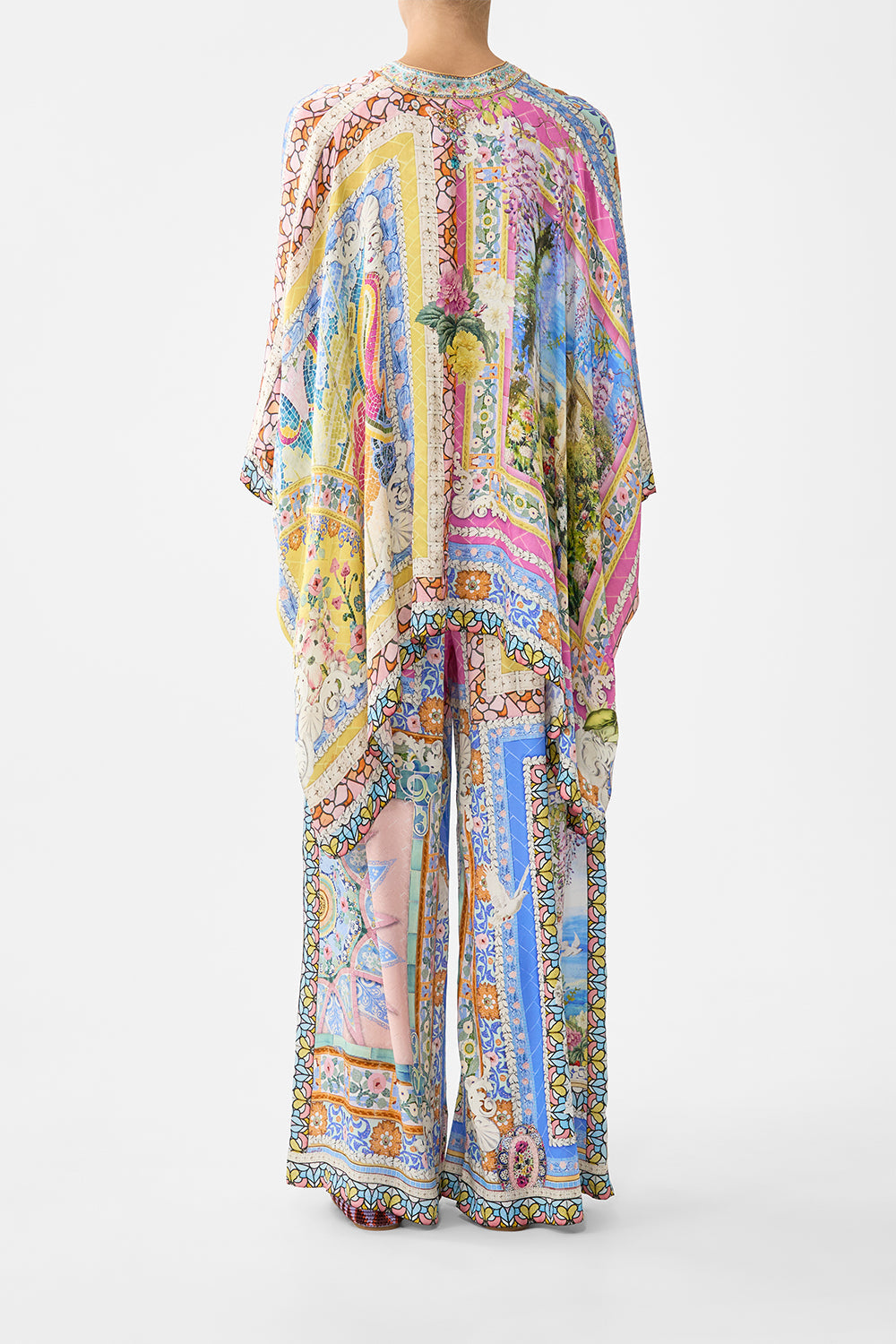 The CAMILLA TIE TOP BUCKET BAG WITH TASSELS MEET ME IN MALLORCA in our  print.