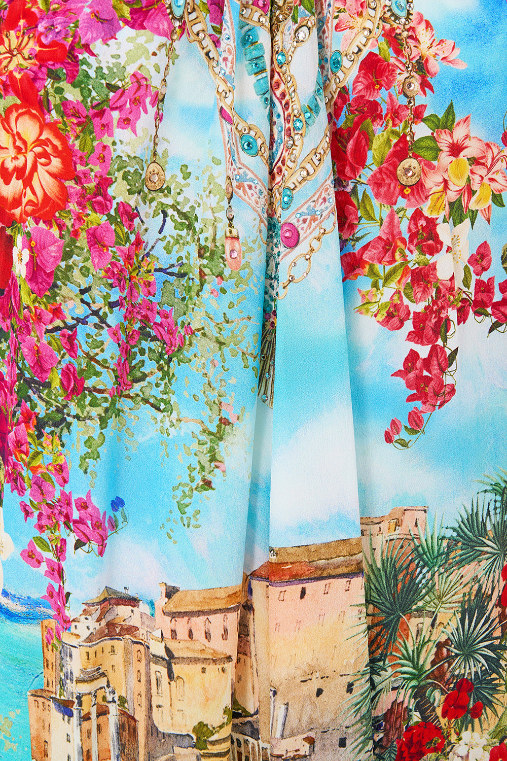 The CAMILLA LONG V NECK KAFTAN WITH RING FRONT TRIM MEET ME IN MALLORCA in our  print.