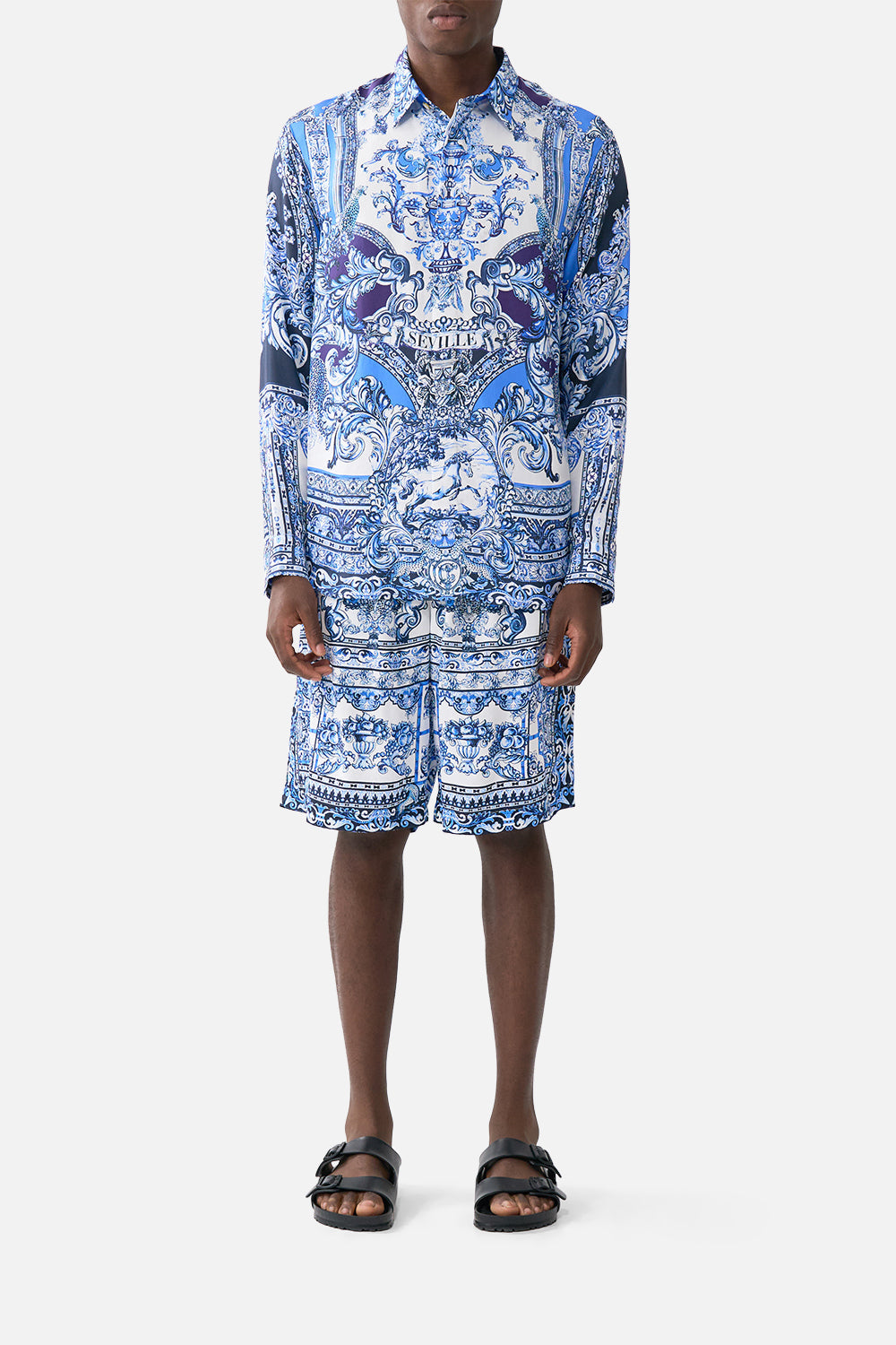 The CAMILLA LONG SLEEVE TIERED SHORT DRESS MAGIC OF THE MERCADO in our  print.