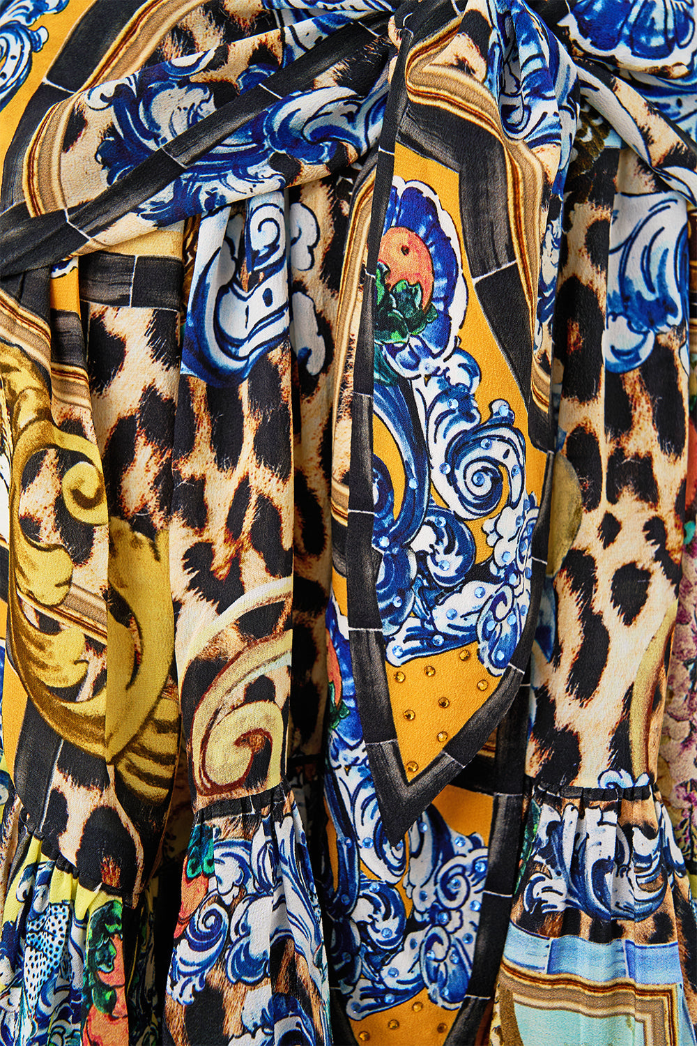 The CAMILLA RING SCARF CLUTCH DAUGHTERS OF DUENDE in our  print.