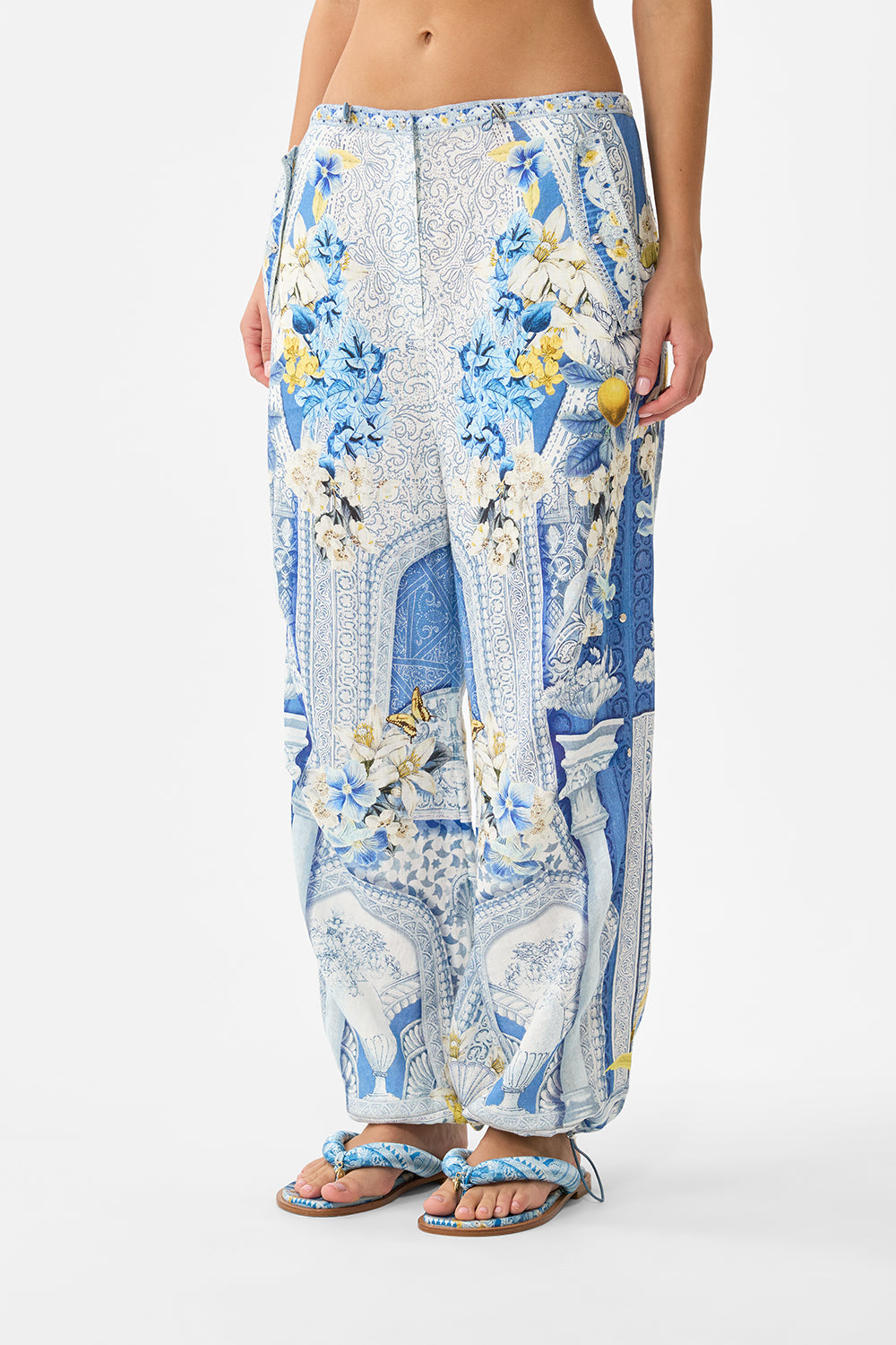 The CAMILLA TAILORED PANT WITH WAIST BUTTON DETAIL FLAMENCO FOLKLORE in our  print.