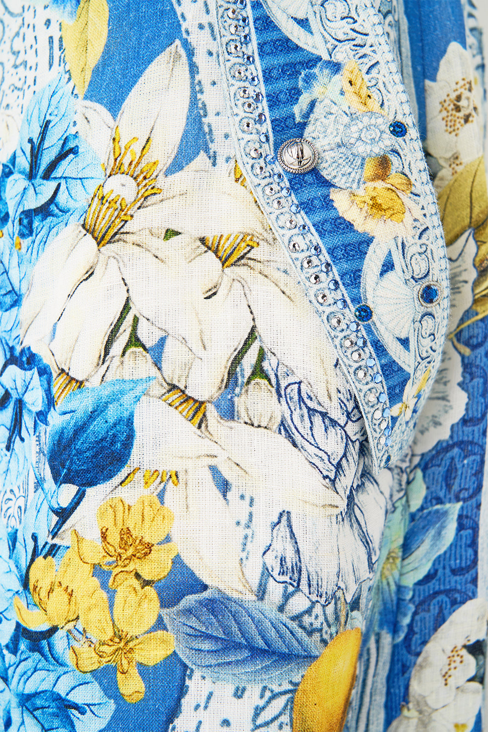 The CAMILLA TAILORED PANT WITH WAIST BUTTON DETAIL FLAMENCO FOLKLORE in our  print.