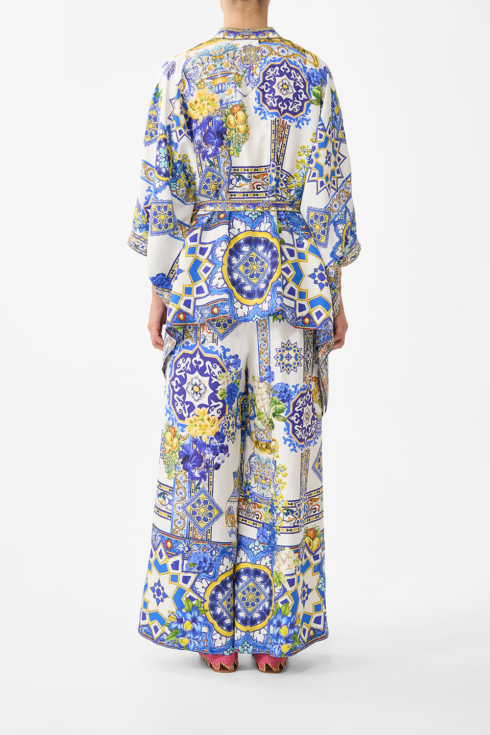 The CAMILLA LACE UP V NECK BLOUSE WITH CASCADE RUFFLES SEVILLE SWEETHEART in our  print.