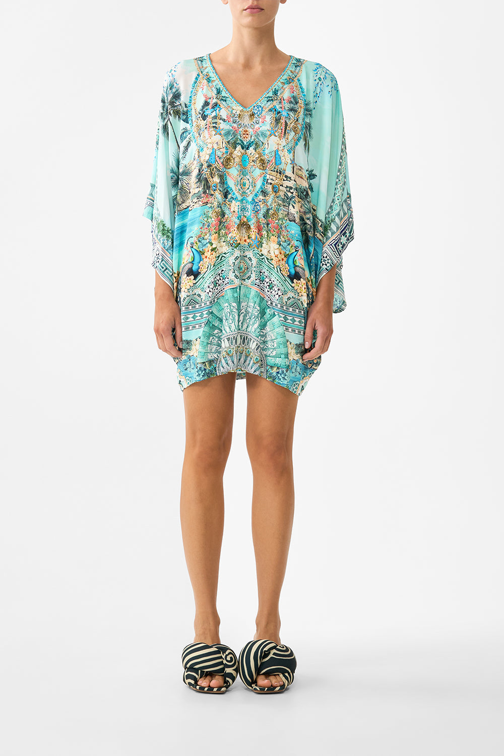 The CAMILLA KIDS TIERED MINI DRESS W FRILL NECK HOWDY GAUDI in our HOWDY GAUDI print.