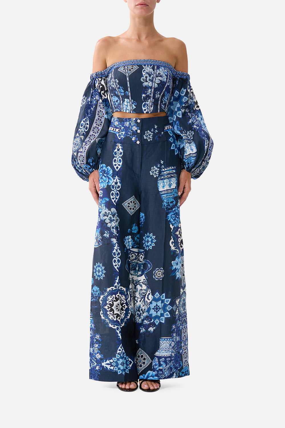 The CAMILLA TRI BIKINI TOP WITH RUCHED EDGES DAUGHTERS OF DUENDE in our  print.