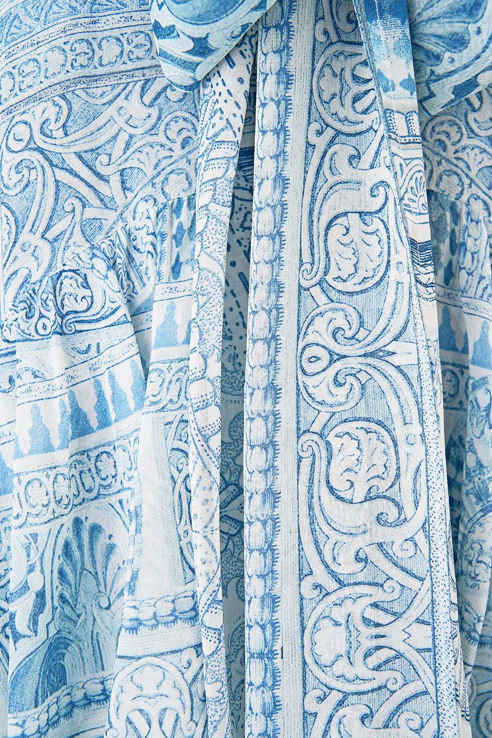 The CAMILLA SCARF CLUTCH VA VA VINTAGE in our  print.