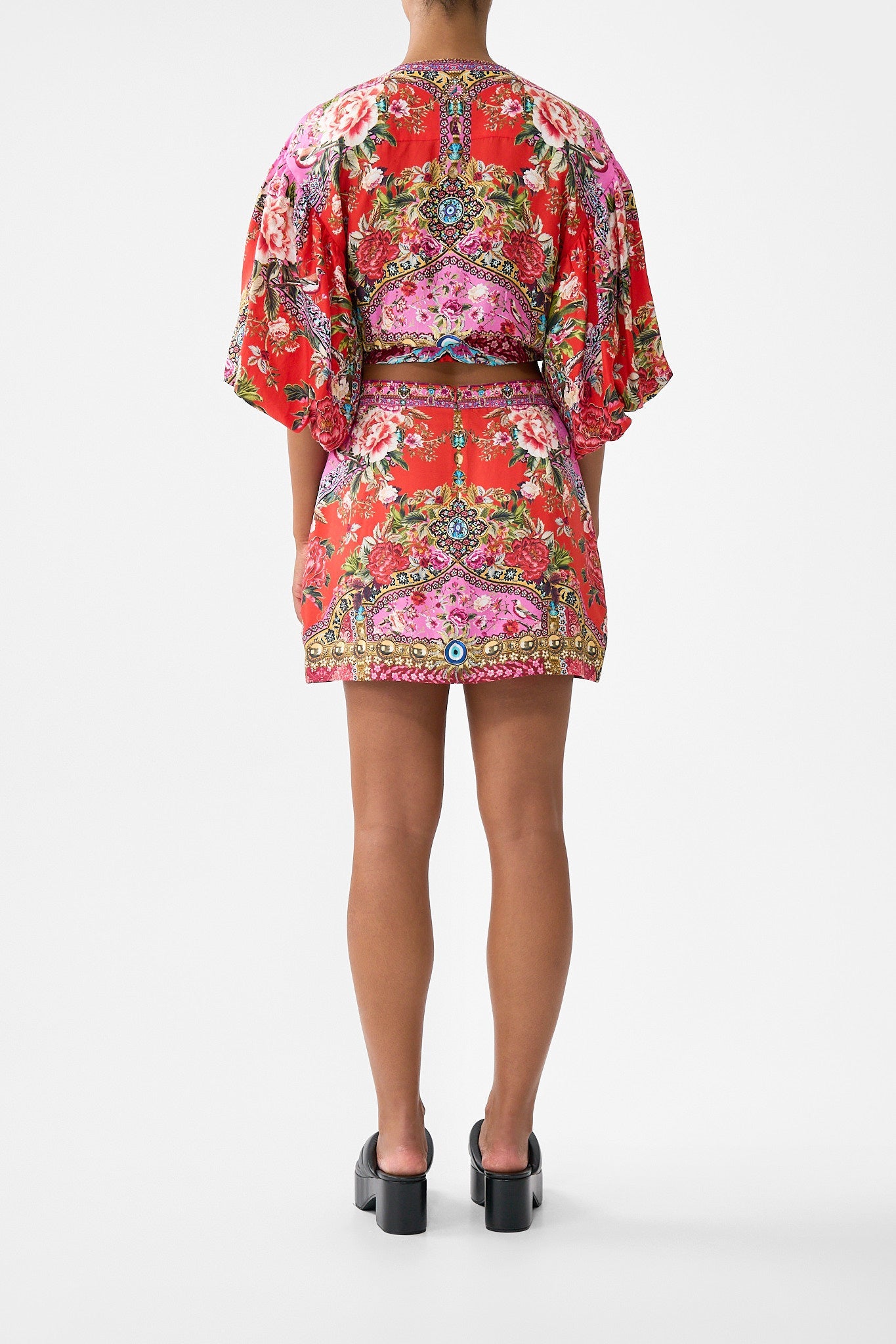 The CAMILLA SHORT SLEEVE OVERSIZED SHIRT HOUSE OF HOROSCOPES in our  print.
