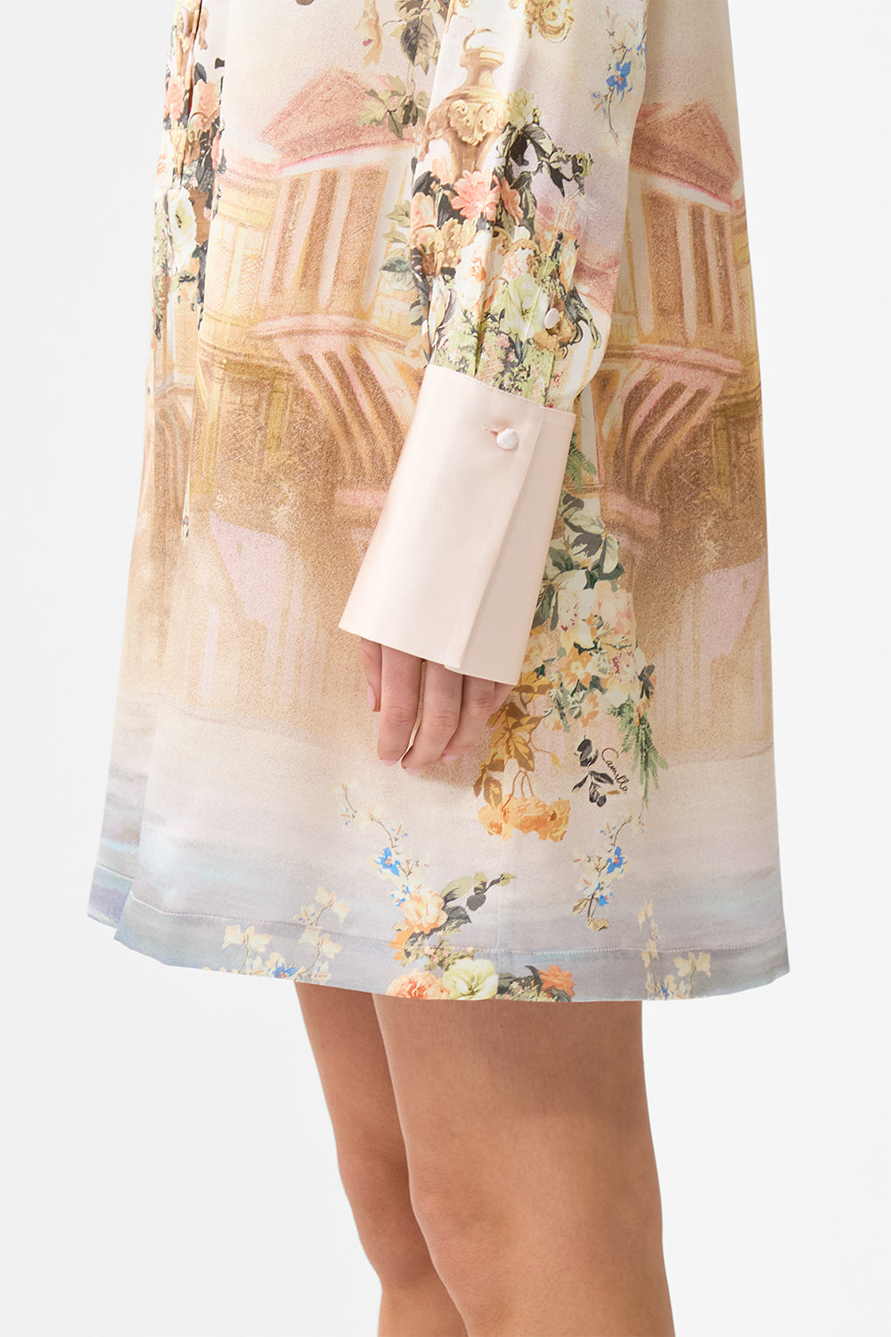 The CAMILLA KIDS LAYERED MINI SKIRT WITH BABYLOCKED EDGES FLAMENCO ROSE in our  print.