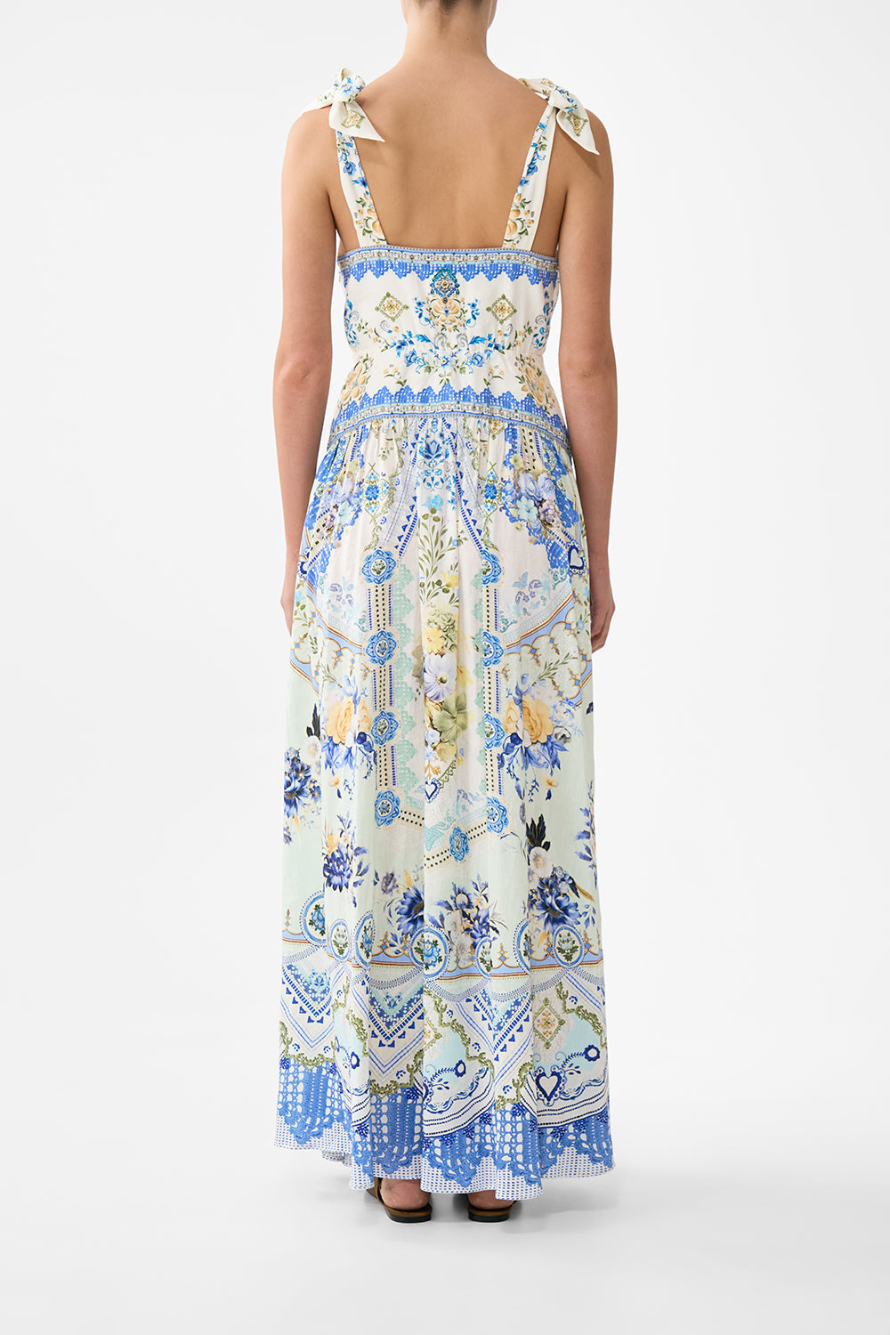 The CAMILLA KIDS TANK TOP WITH FRILL EDGE NAVÀS NOUVEAU in our NAVÀS NOUVEAU print.