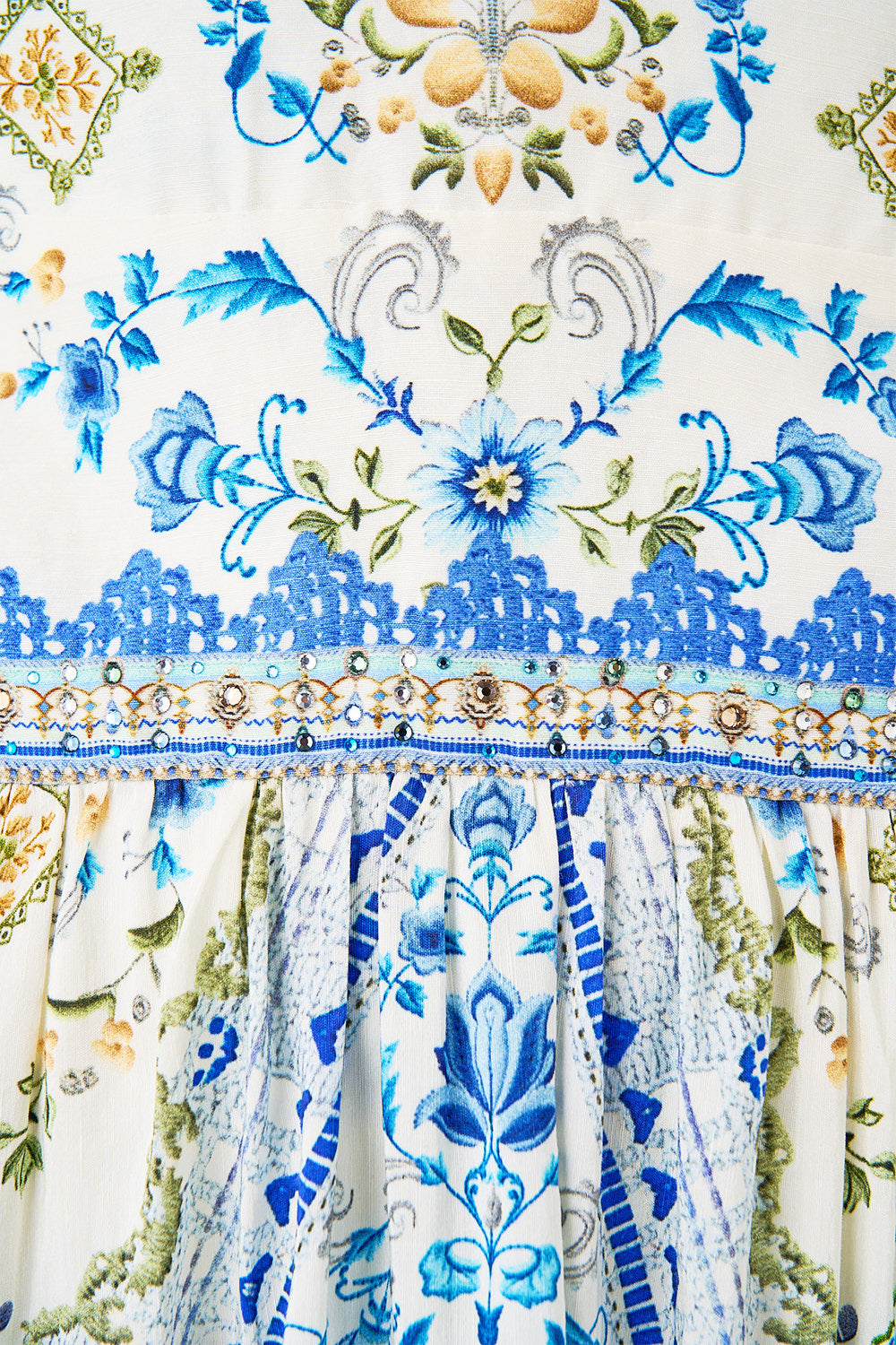 The CAMILLA BUTTON FRONT HALTER PLAYSUIT SEVILLIAN STYLE in our  print.