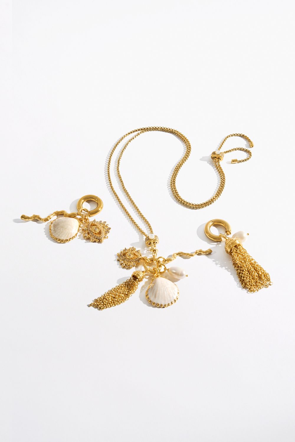 ENCHANTED OCEANIA ASYMMETRICAL DROP EARRINGS GOLD