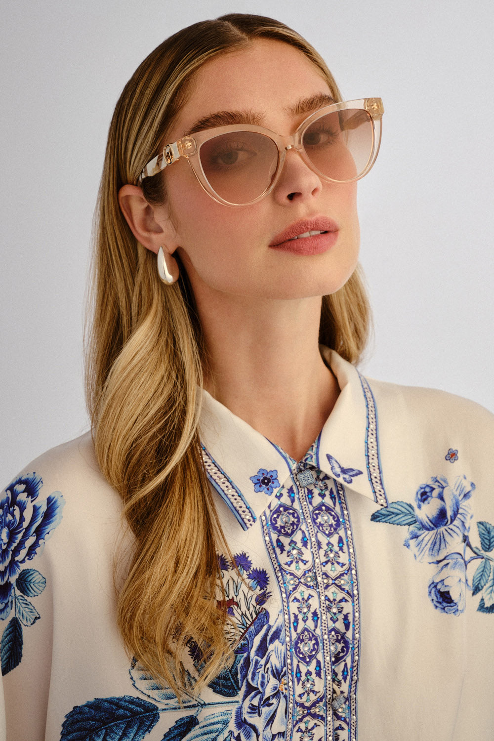 The CAMILLA MID RISE FIT AND FLARE TROUSER AMULETS AND ALCHEMY in our  print.