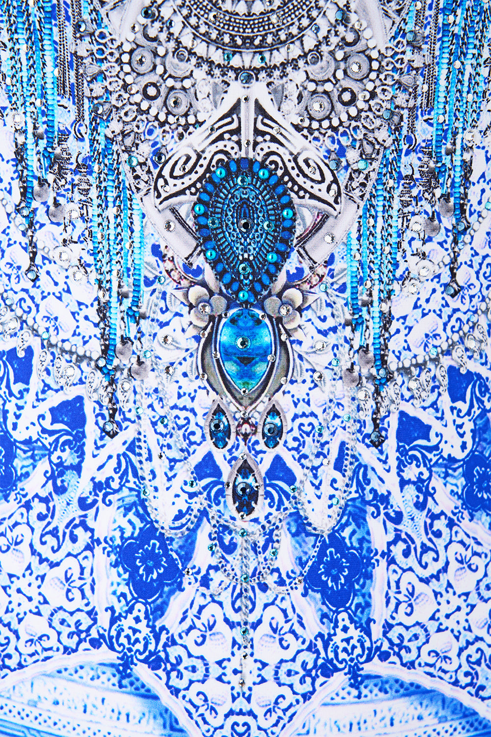 The CAMILLA RAGLAN BLOUSE WITH FRONT RUFFLE ARANJUEZ ANIMALIA in our  print.