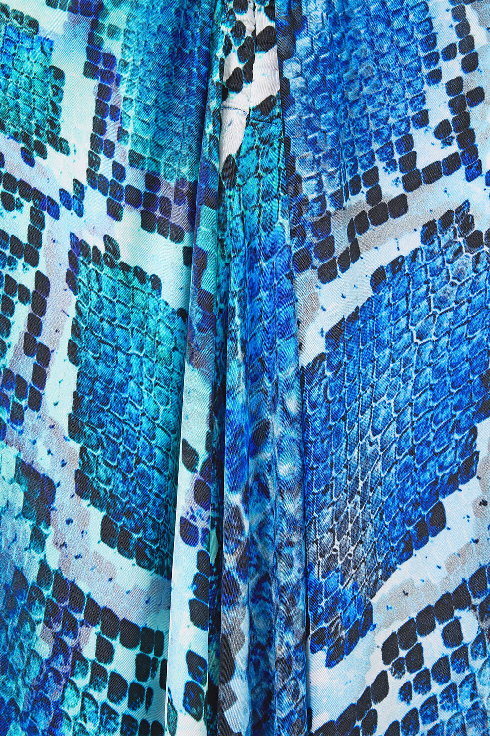 The CAMILLA SMALL CANVAS CLUTCH LEOTIGRA LAND in our LEOTIGRA LAND print.