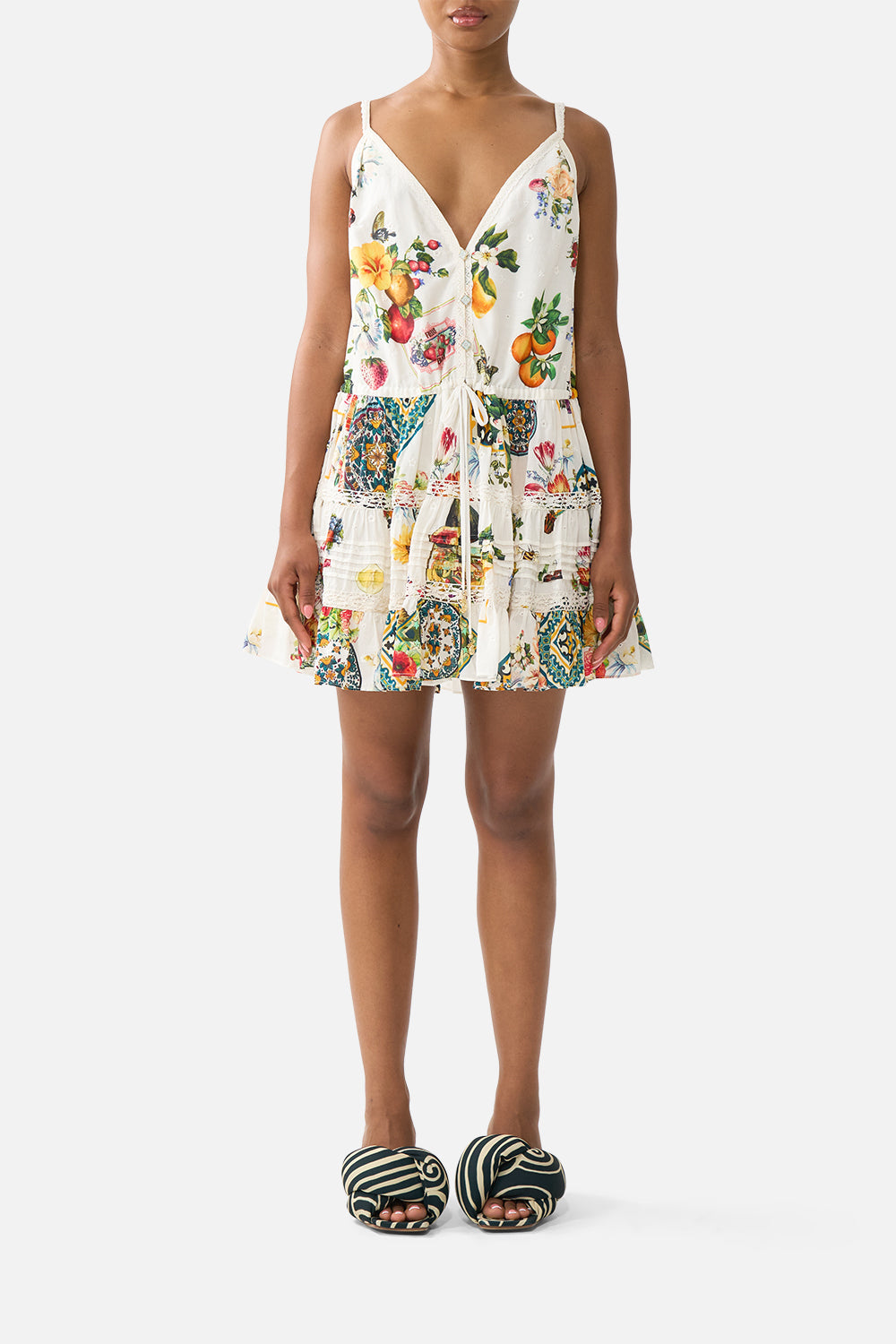 The CAMILLA SHORT V NECK KAFTAN W RING FRONT TRIM WANDERLUST EMPIRE in our WANDERLUST EMPIRE print.