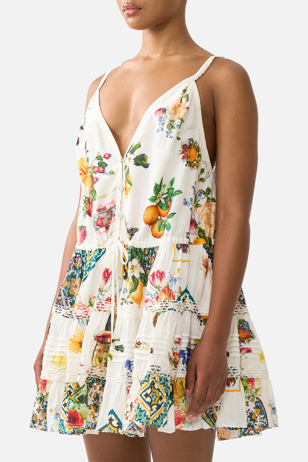 The CAMILLA SHORT V NECK KAFTAN W RING FRONT TRIM WANDERLUST EMPIRE in our  print.
