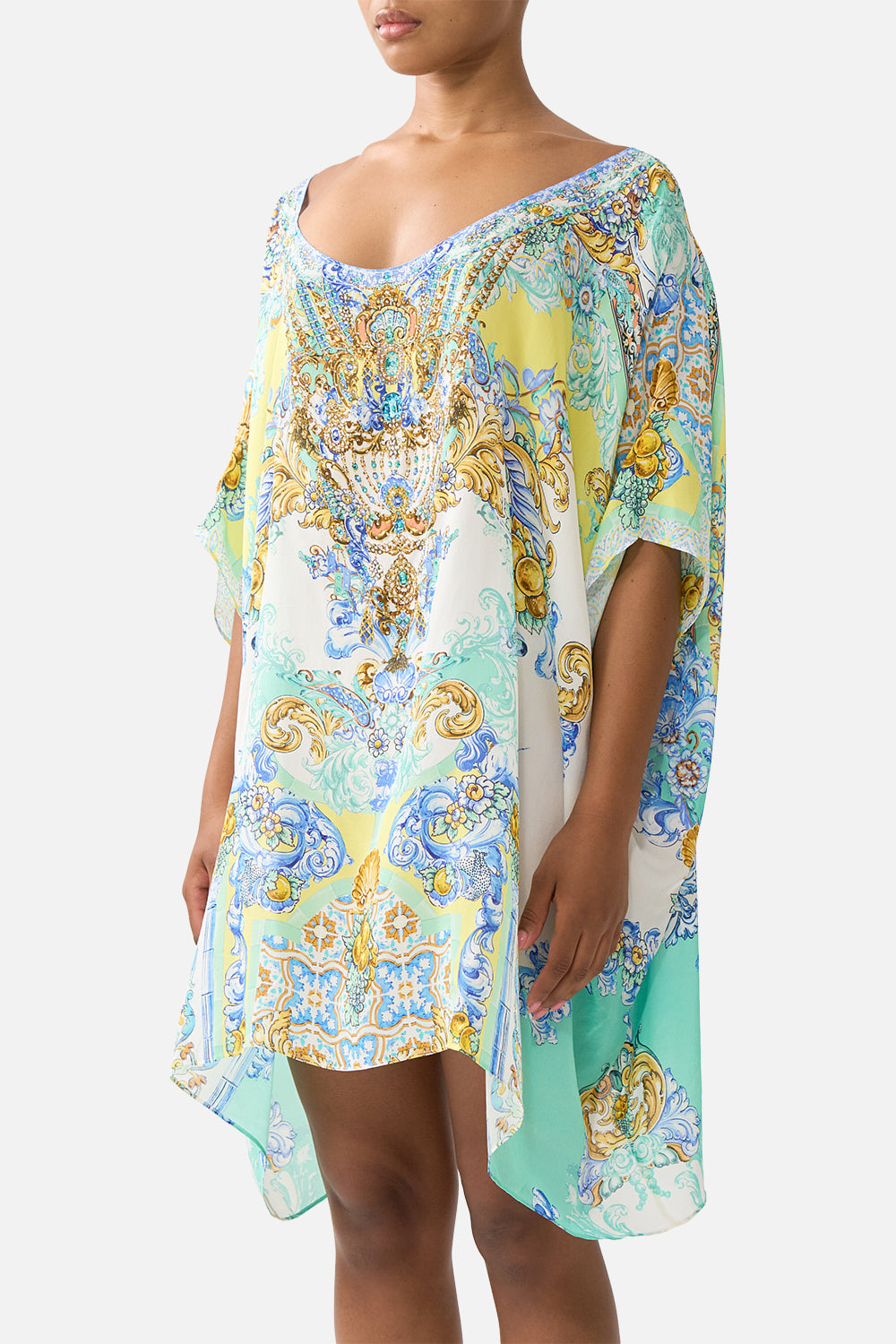 The CAMILLA KNIT JUMPER WITH PLEATED SILK BACK FIESTA, SIESTA, REPEAT in our FIESTA, SIESTA, REPEAT print.