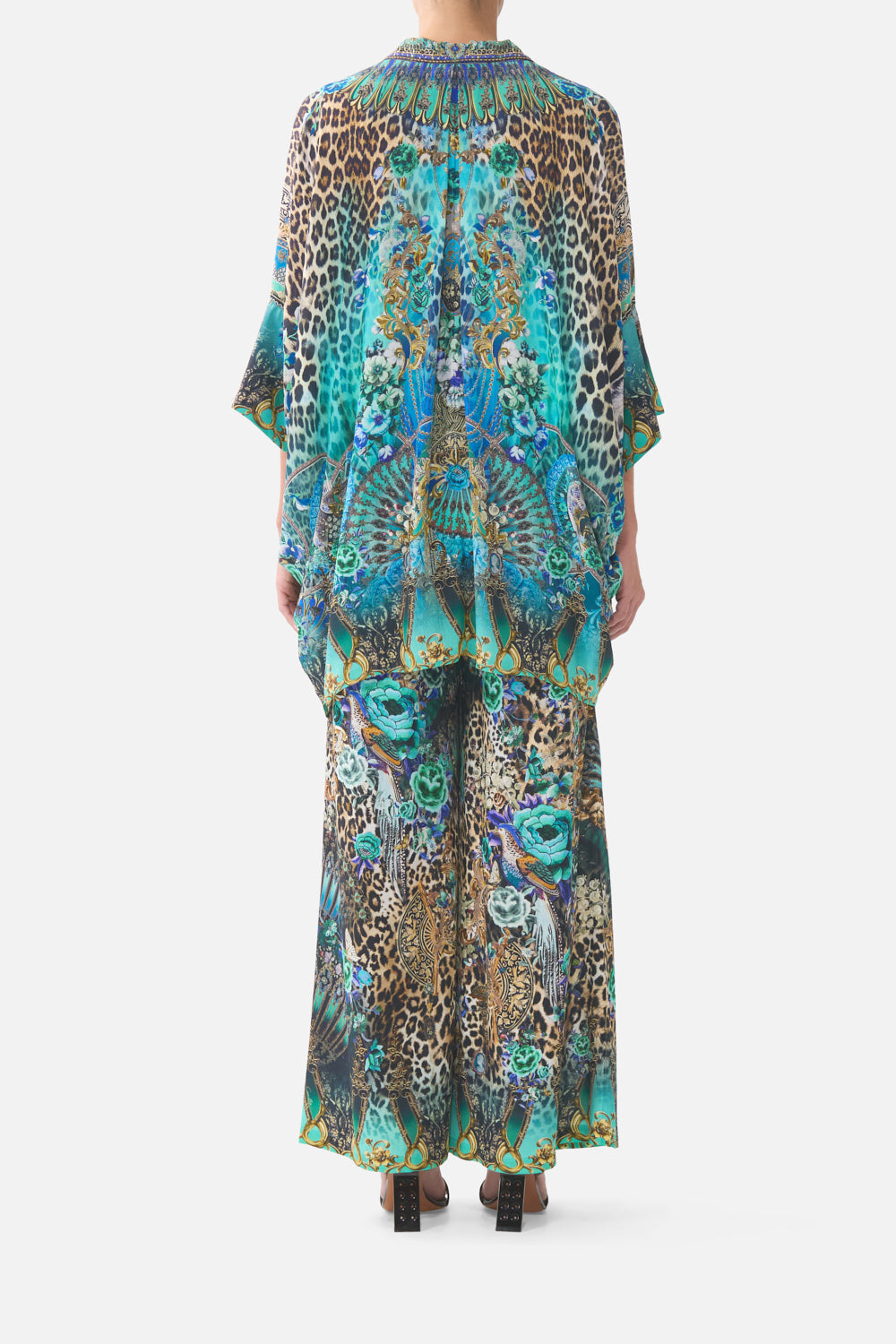 The CAMILLA LONG V NECK KAFTAN WITH RING FRONT TRIM MEET ME IN MALLORCA in our  print.