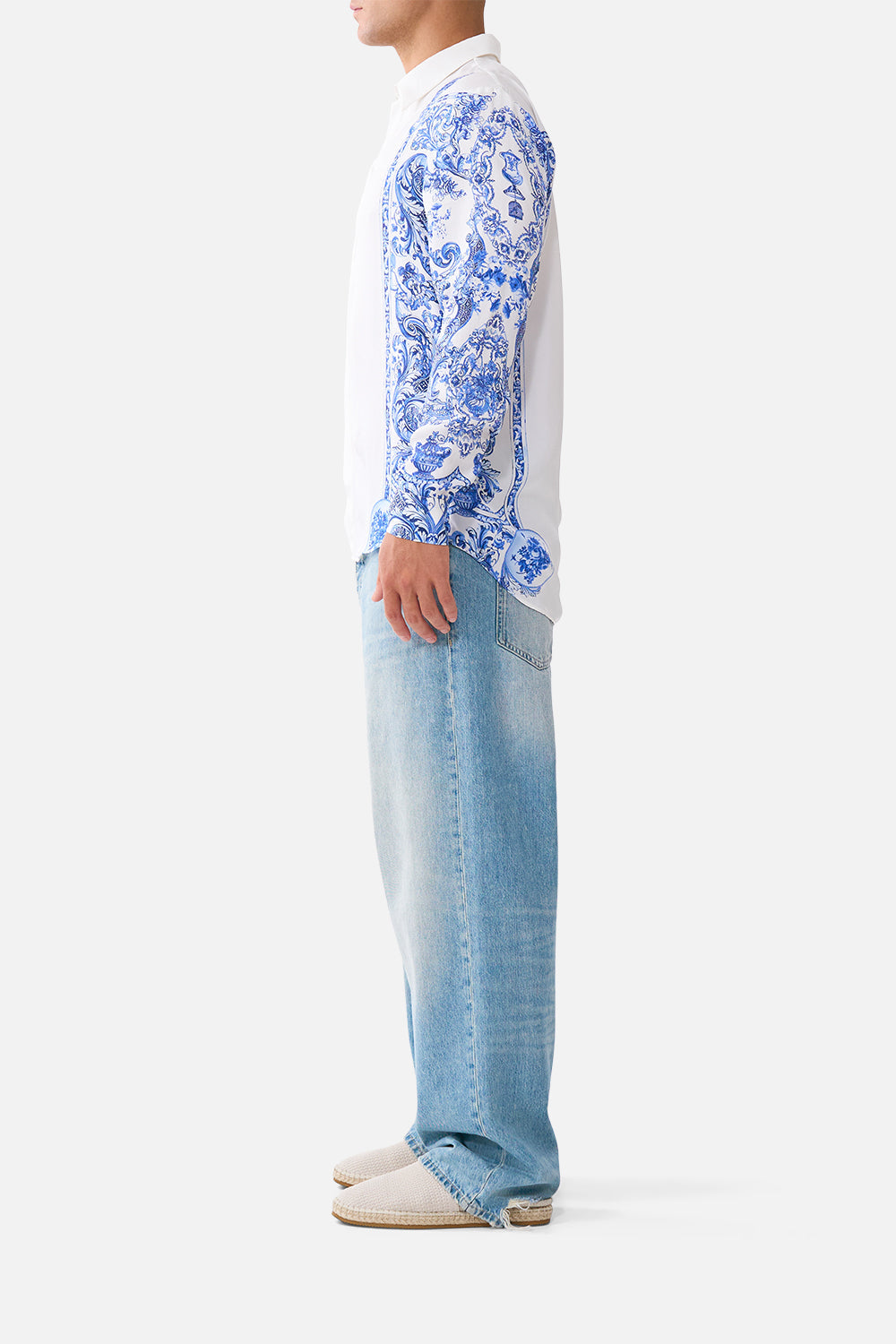 The CAMILLA SHORT BUTTON FRONT SHIRT DRESS NIGHT GARDEN in our  print.