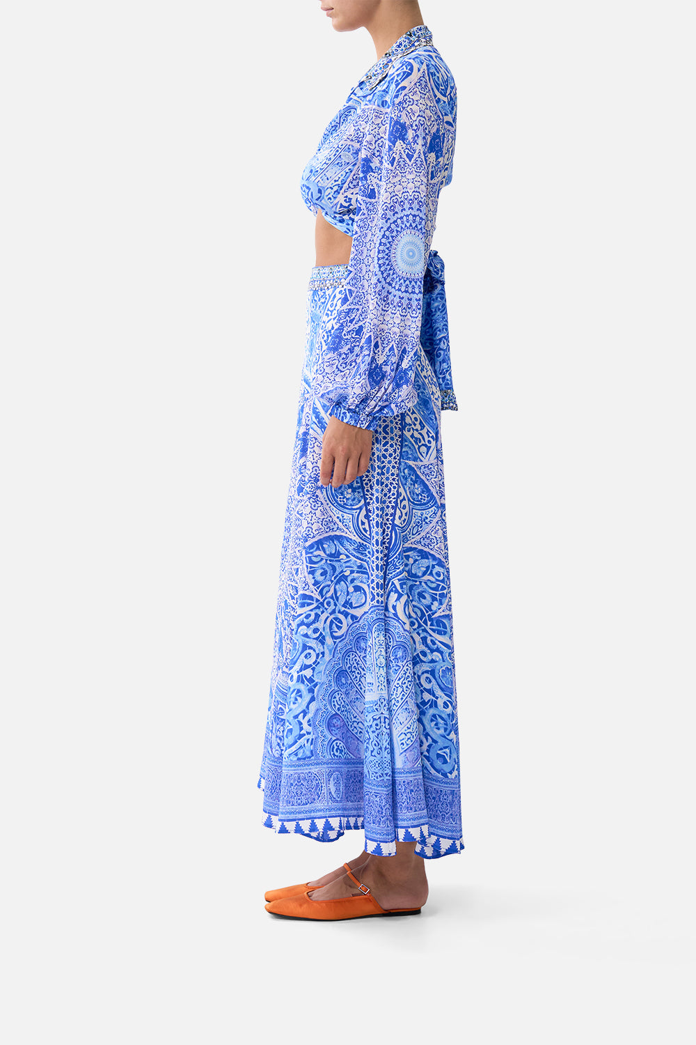 The CAMILLA FRILL NECK DRESS WITH HARDWARE NAZAR NIRVANA in our  print.