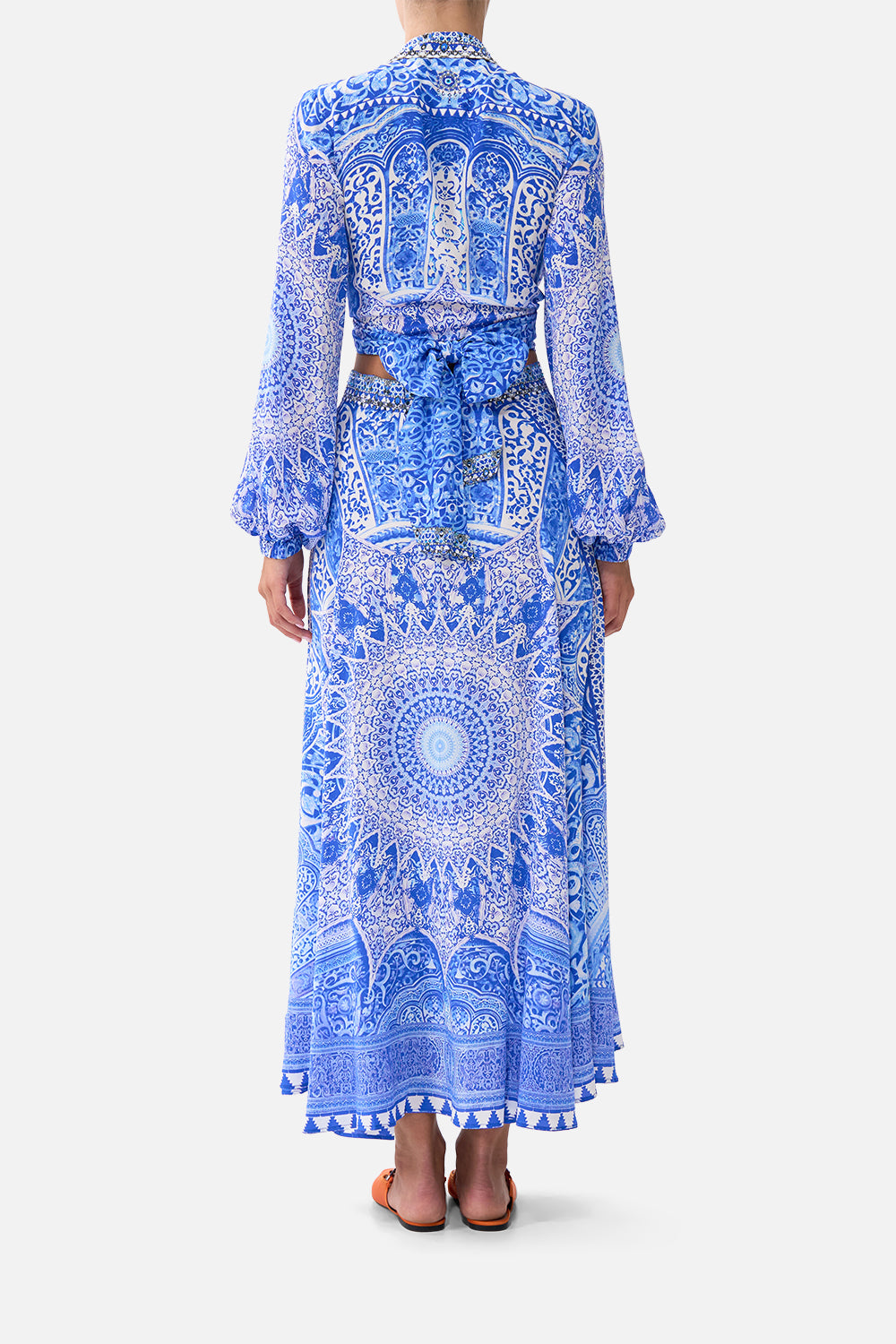 The CAMILLA FRILL NECK DRESS WITH HARDWARE NAZAR NIRVANA in our  print.