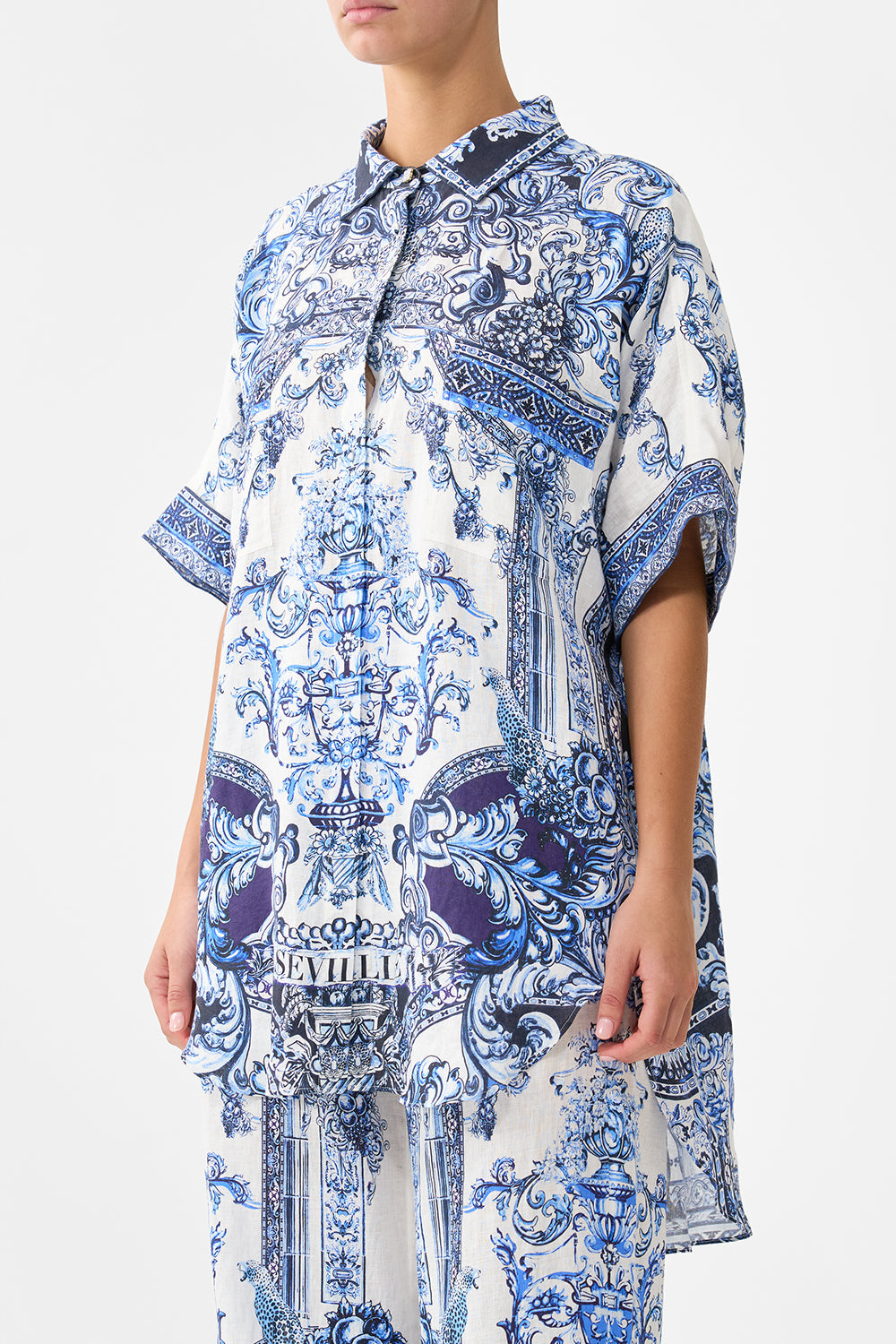 The CAMILLA FRILL SLEEVE TIERED SHORT DRESS VA VA VINTAGE in our  print.