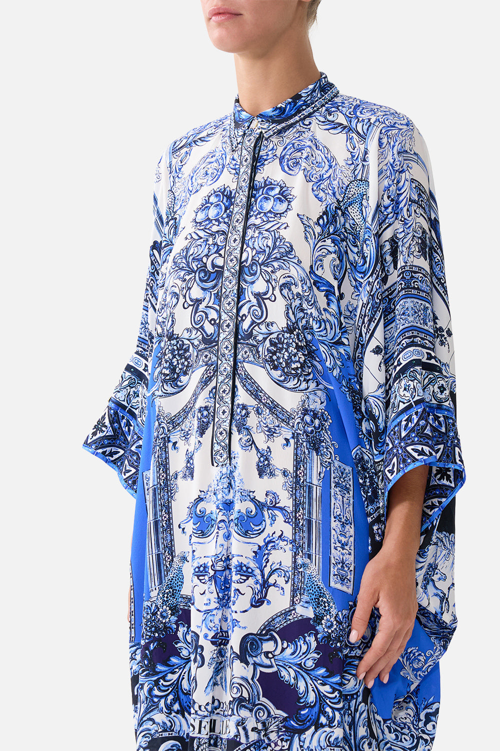 The CAMILLA MID LENGTH BOARDSHORT WITH ELASTIC WAIST MILLA IN SEVILLA in our  print.