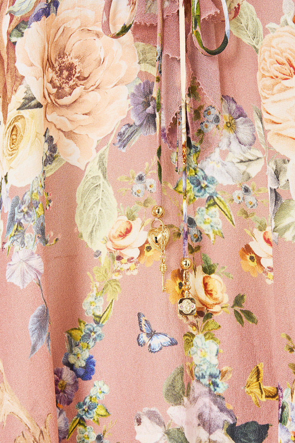 The CAMILLA V NECK BIAS SLIP DRESS WITH BACK FRILL WILDFLOWER WUNDERLAND in our  print.