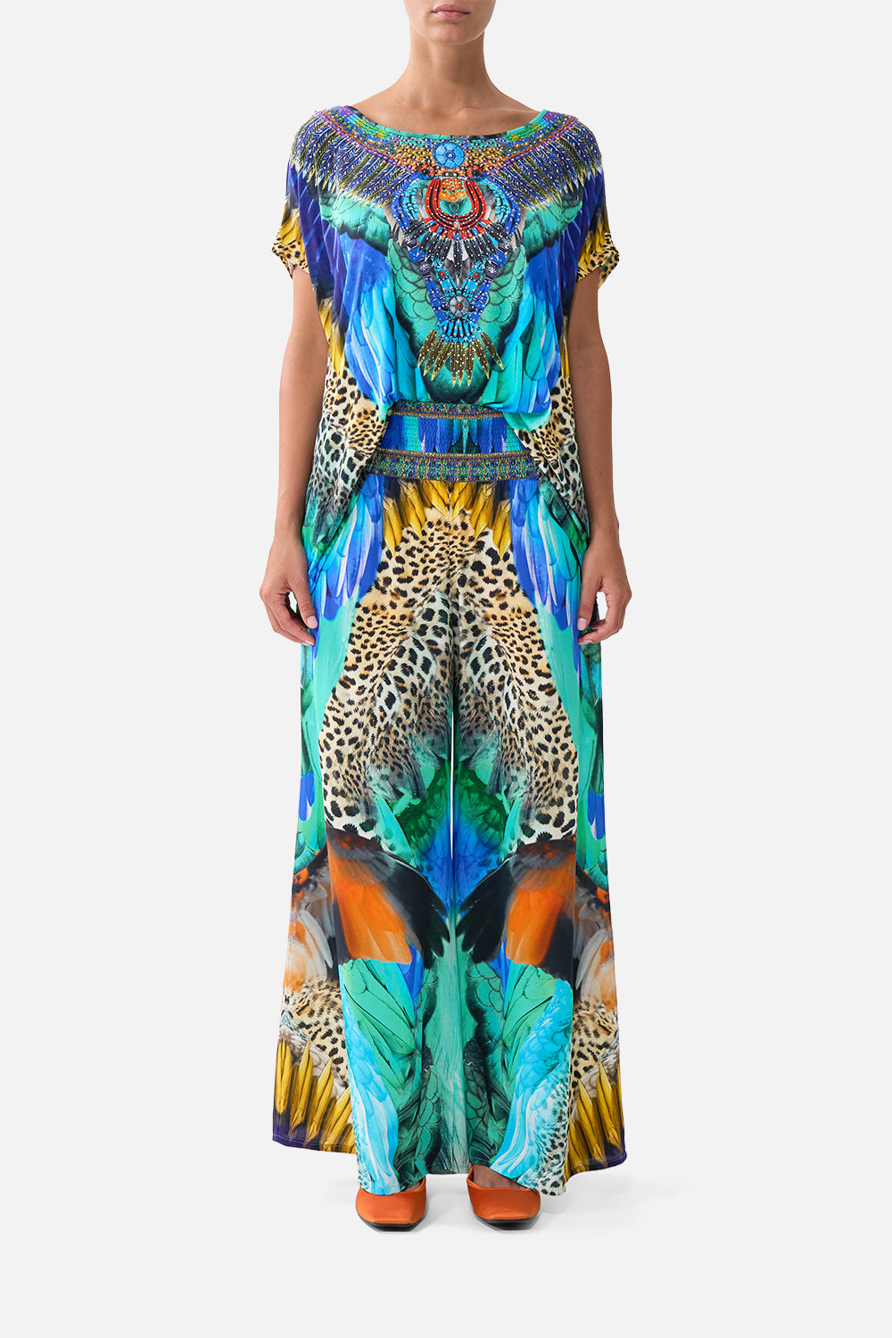 The CAMILLA DRAWSTRING POUCH BAG DAUGHTERS OF DUENDE in our  print.
