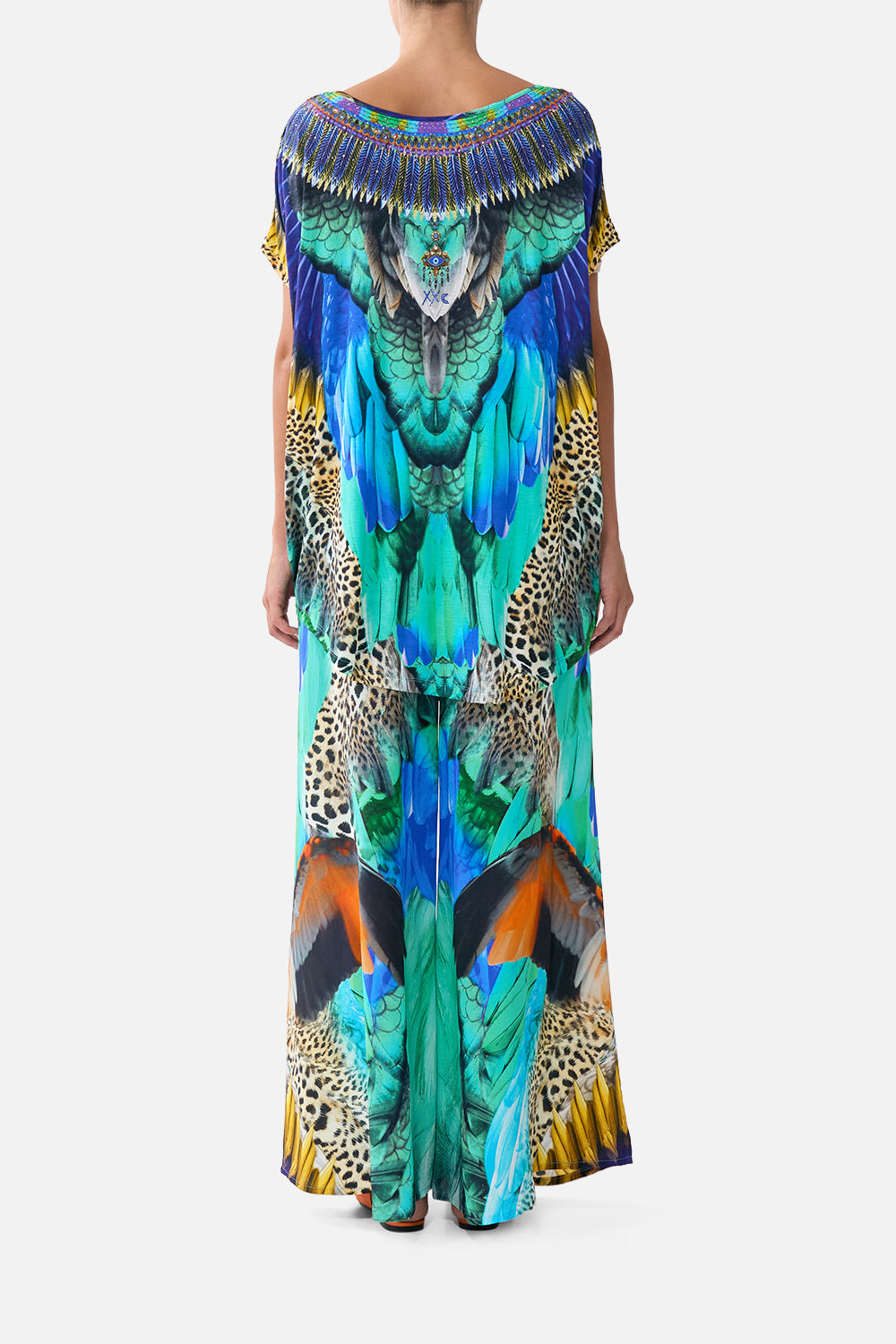 The CAMILLA DRAWSTRING POUCH BAG DAUGHTERS OF DUENDE in our  print.