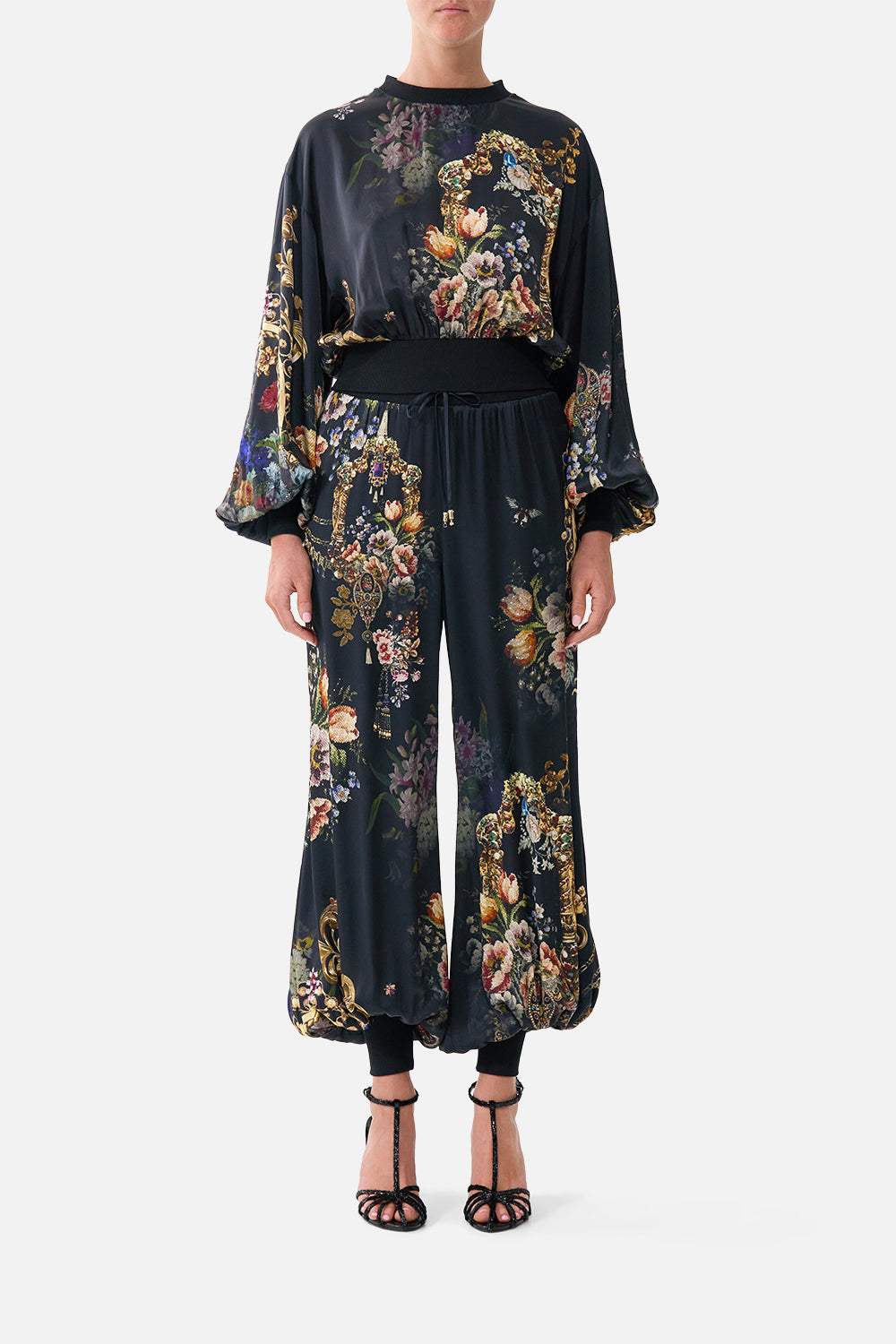 The CAMILLA SHORT SLEEVE CAMP COLLARED SHIRT DANDELION SKIES in our  print.