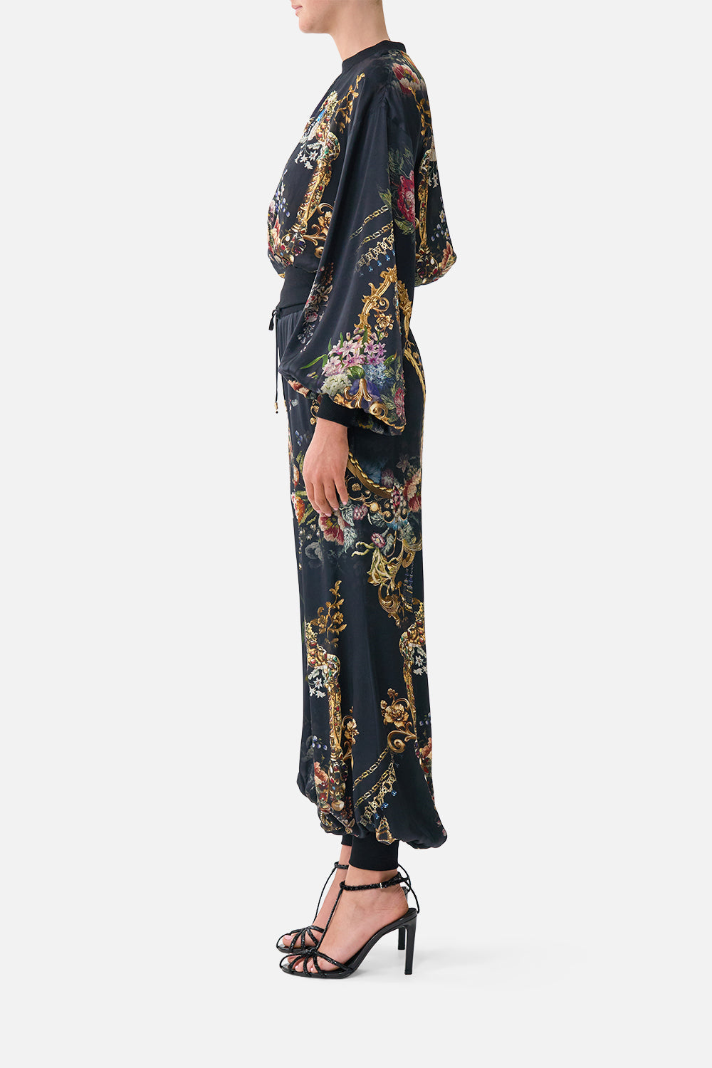The CAMILLA SHORT SLEEVE CAMP COLLARED SHIRT DANDELION SKIES in our  print.