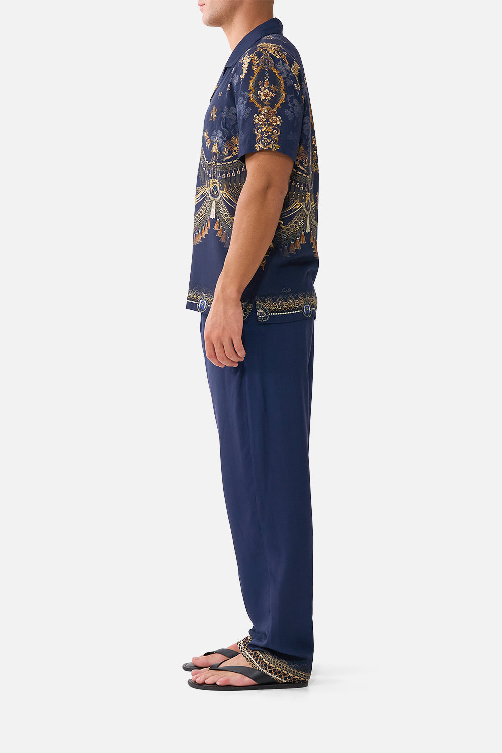 The CAMILLA Short Sleeve Camp Collared Shirt in our Cloaked in Baroque print, side view on model.