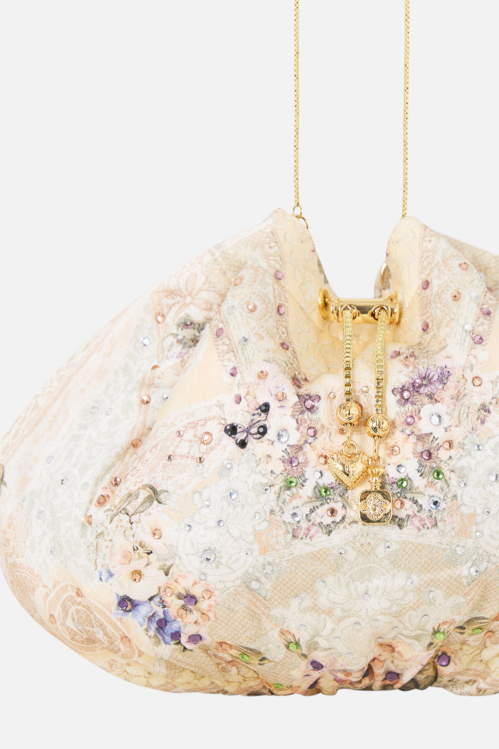 The CAMILLA LACE UP V NECK BLOUSE WITH CASCADE RUFFLES CHAMBER OF BLOOMS in our  print.