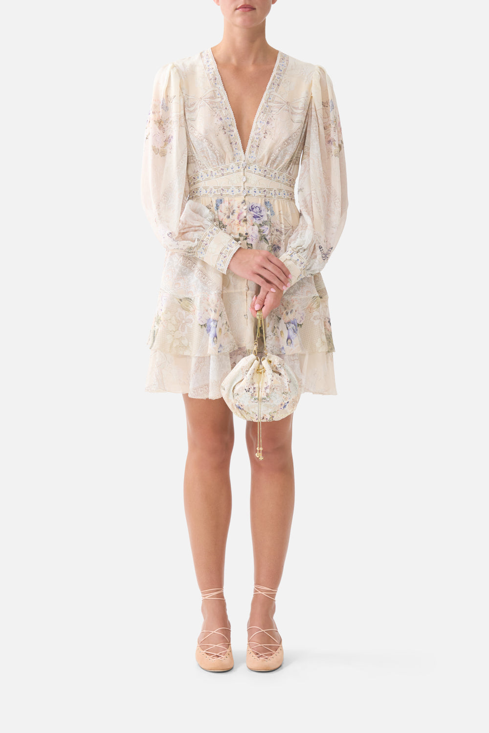 The CAMILLA LACE UP V NECK BLOUSE WITH CASCADE RUFFLES CHAMBER OF BLOOMS in our  print.